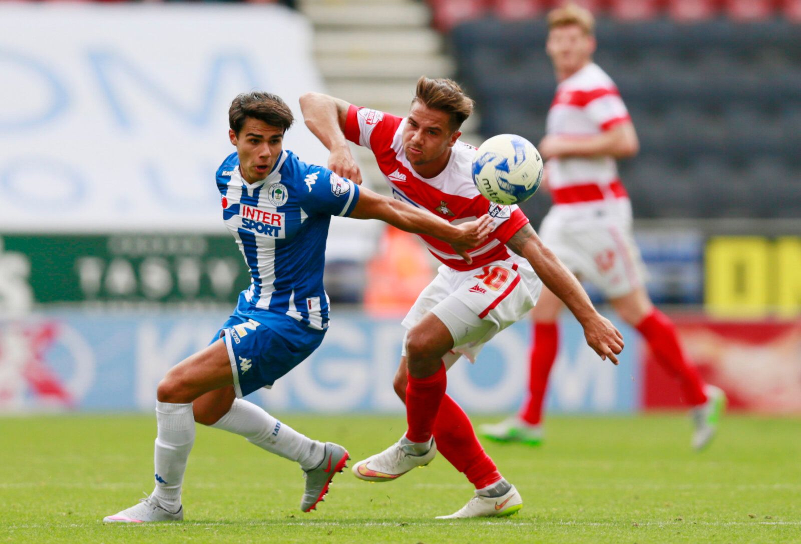 Football - Wigan Athletic v Doncaster Rovers - Sky Bet Football League One - DW Stadium - 16/8/15
Wigan Athletic's Reece James and Doncaster Rovers' Harry Forrester in action
Mandatory Credit: Action Images / Jason Cairnduff
Livepic
EDITORIAL USE ONLY. No use with unauthorized audio, video, data, fixture lists, club/league logos or 