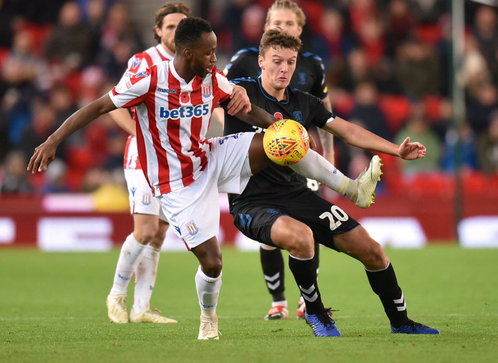 Soccer Football - Championship - Stoke City v Middlesbrough - bet365 Stadium, Stoke-on-Trent, Britain - November 3, 2018   Stoke City's Saido Berahino in action with Middlesbrough's Dael Fry   Action Images/Paul Burrows    EDITORIAL USE ONLY. No use with unauthorized audio, video, data, fixture lists, club/league logos or 