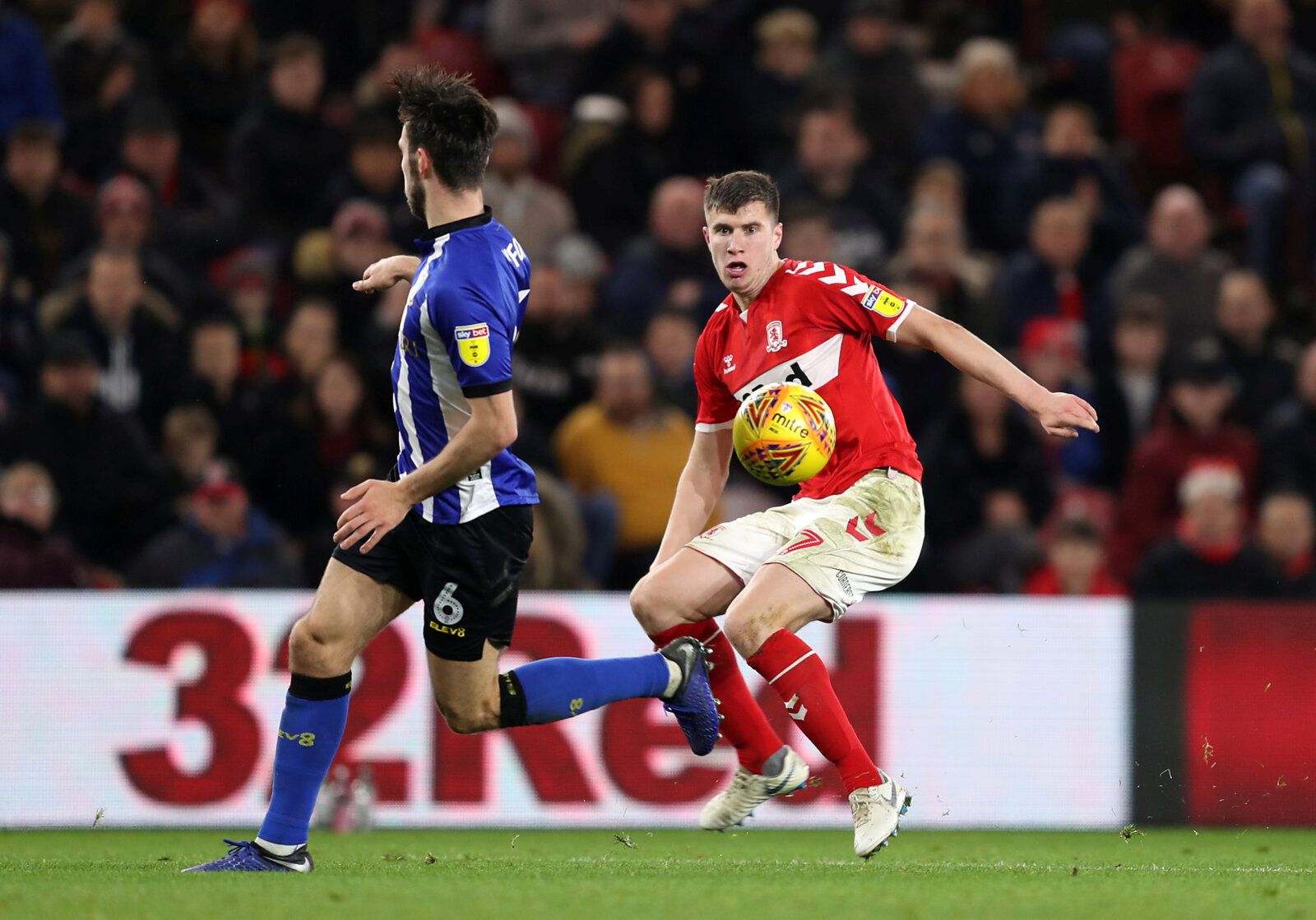 Soccer Football - Championship - Middlesbrough v Sheffield Wednesday - Riverside Stadium, Middlesbrough, Britain - December 26, 2018   Middlesbrough's Paddy McNair in action with Sheffield Wednesday's Morgan Fox   Action Images/John Clifton    EDITORIAL USE ONLY. No use with unauthorized audio, video, data, fixture lists, club/league logos or 