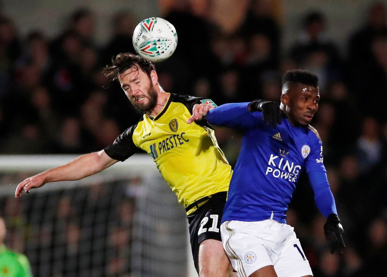 Soccer Football - Carabao Cup - Fourth Round - Burton Albion v Leicester City - Pirelli Stadium, Burton-on-Trent, Britain - October 29, 2019  Burton Albion's John-Joe O'Toole in action with Leicester City's Kelechi Iheanacho    Action Images via Reuters/Andrew Boyers  EDITORIAL USE ONLY. No use with unauthorized audio, video, data, fixture lists, club/league logos or 