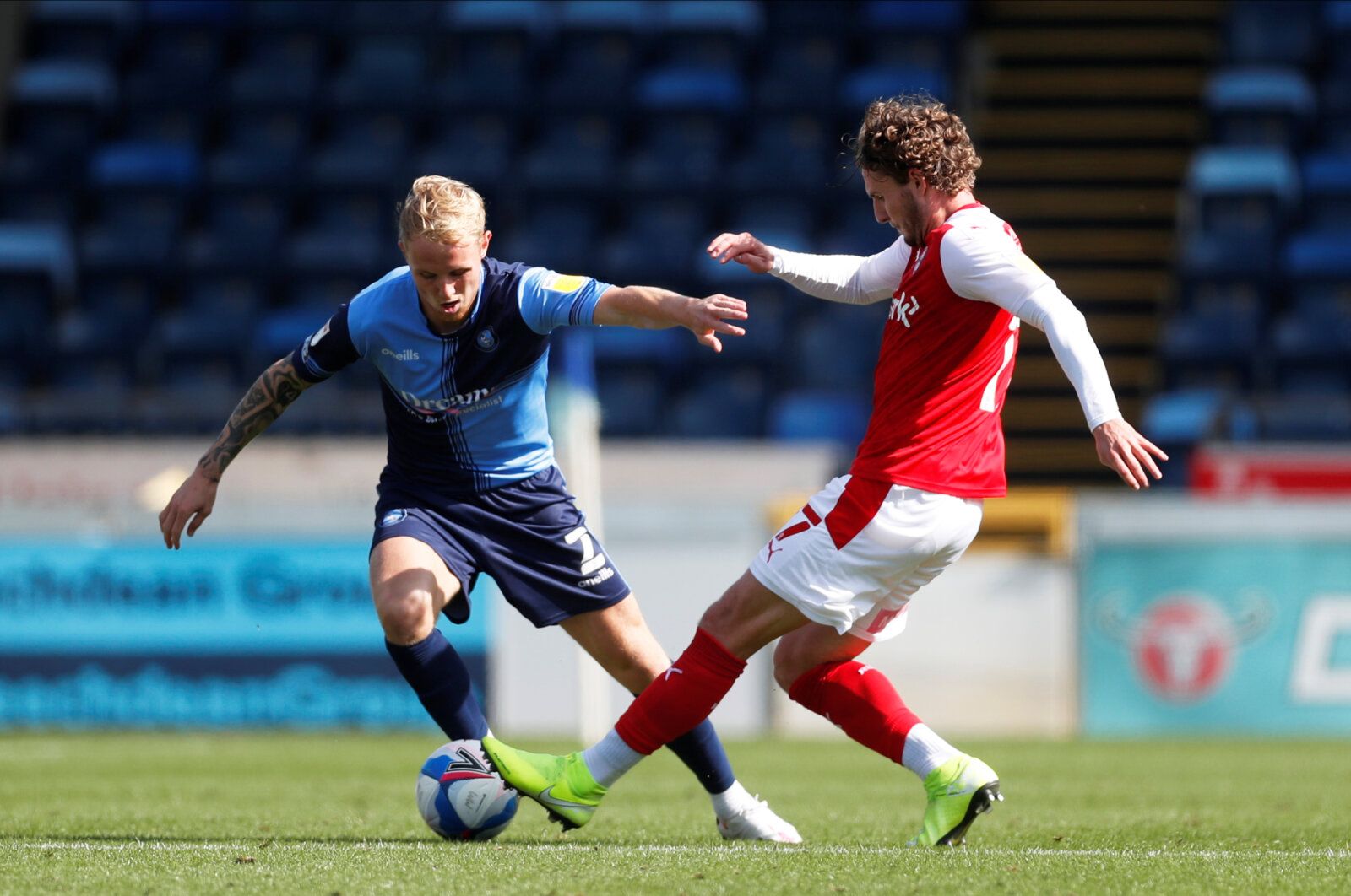 Soccer Football - Championship - Wycombe Wanderers v Rotherham United - Adams Park, High Wycombe, Britain - September 12, 2020   Wycombe Wanderers’ Jack Grimmer in action with Rotherham United’s Kieran Sadlier   Action Images/Matthew Childs    EDITORIAL USE ONLY. No use with unauthorized audio, video, data, fixture lists, club/league logos or 