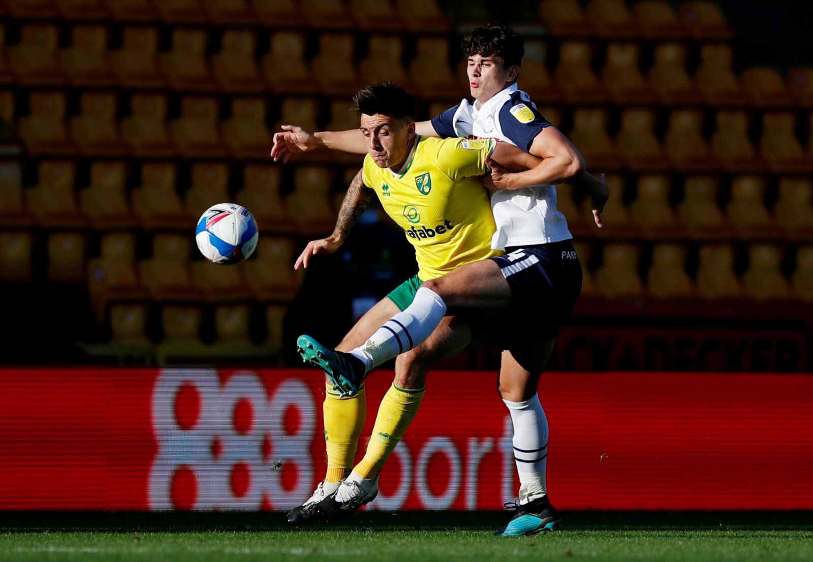 Soccer Football - Championship - Norwich City v Preston North End - Carrow Road, Norwich, Britain - September 19, 2020  Norwich's Jordan Hugill in action with Preston's Jordan Storey       Action Images/Paul Childs  EDITORIAL USE ONLY. No use with unauthorized audio, video, data, fixture lists, club/league logos or 