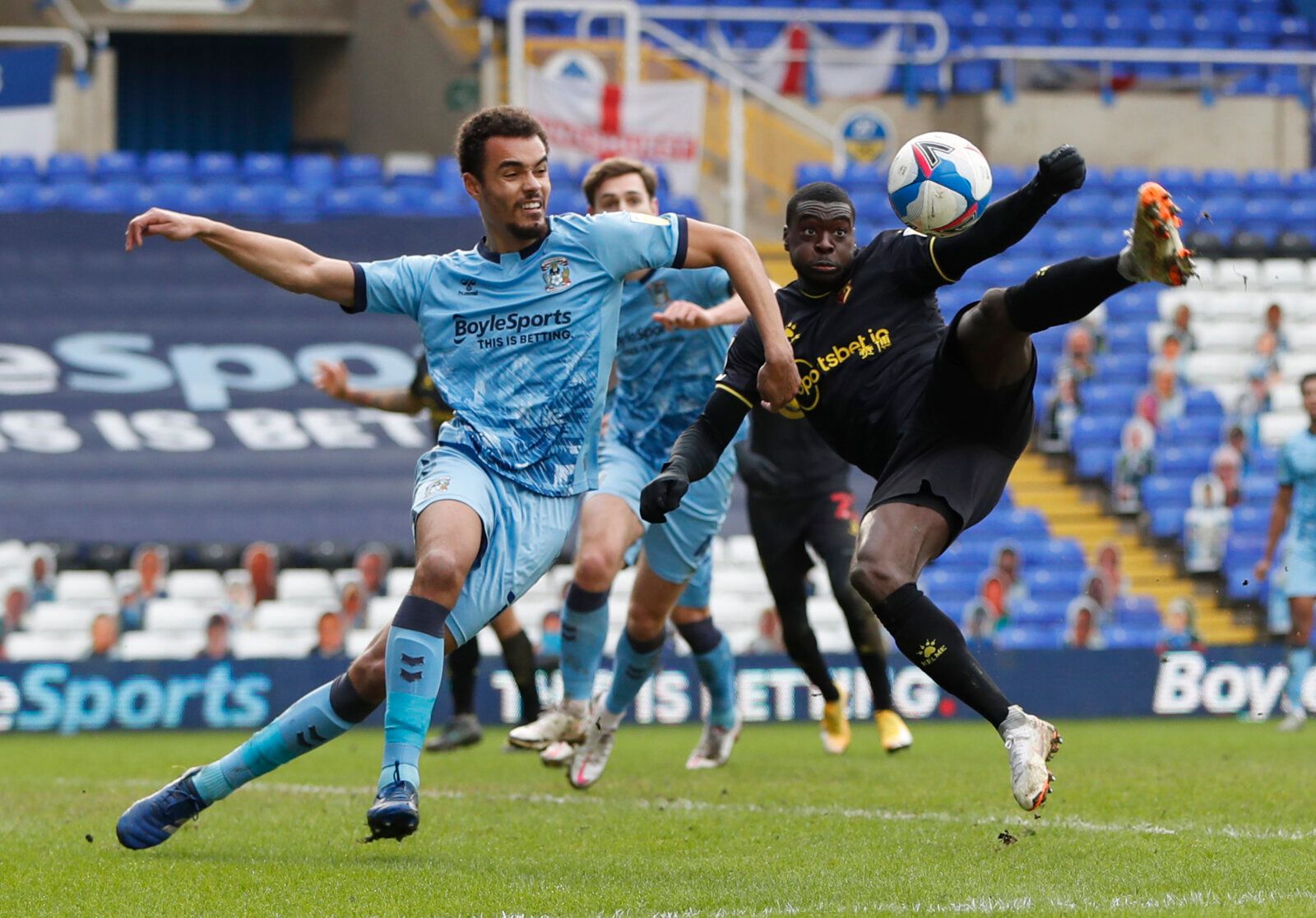 Soccer Football - Championship - Coventry City v Watford - St Andrew's, Birmingham, Britain - February 6, 2021 Watford's Ken Sema in action with Coventry City's Josh Pask Action Images/Paul Childs EDITORIAL USE ONLY. No use with unauthorized audio, video, data, fixture lists, club/league logos or 'live' services. Online in-match use limited to 75 images, no video emulation. No use in betting, games or single club /league/player publications.  Please contact your account representative for furthe