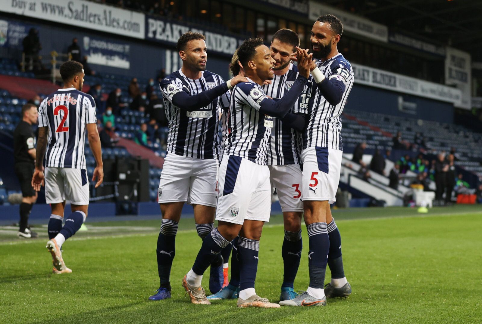 Soccer Football - Premier League - West Bromwich Albion v West Ham United - The Hawthorns, West Bromwich, Britain - May 19, 2021 West Bromwich Albion's Matheus Pereira celebrates their first goal with teammates, an own goal scored by West Ham United's Tomas Soucek Pool via REUTERS/Molly Darlington EDITORIAL USE ONLY. No use with unauthorized audio, video, data, fixture lists, club/league logos or 'live' services. Online in-match use limited to 75 images, no video emulation. No use in betting, ga