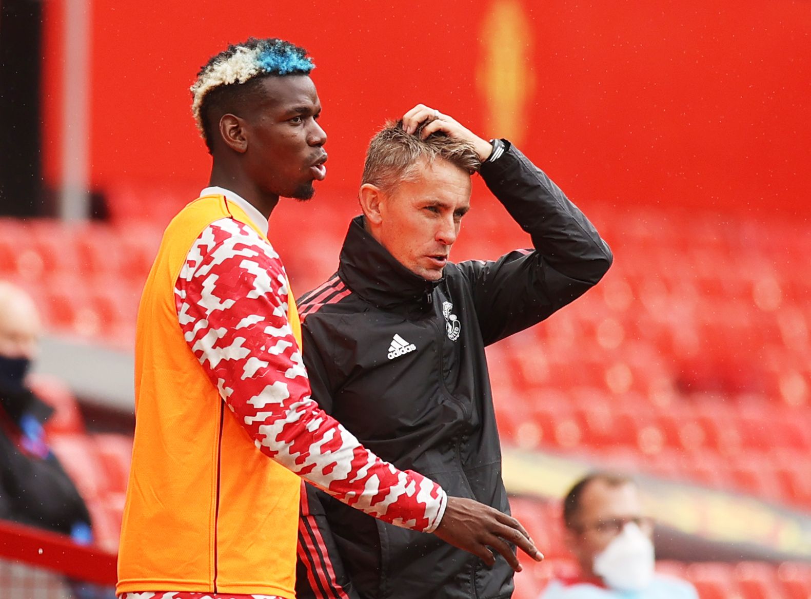 Soccer Football - Pre Season Friendly - Manchester United v Everton - Old Trafford, Manchester, Britain - August 7, 2021 Manchester United's Paul Pogba with first team coach Kieran McKenna Action Images via Reuters/Lee Smith