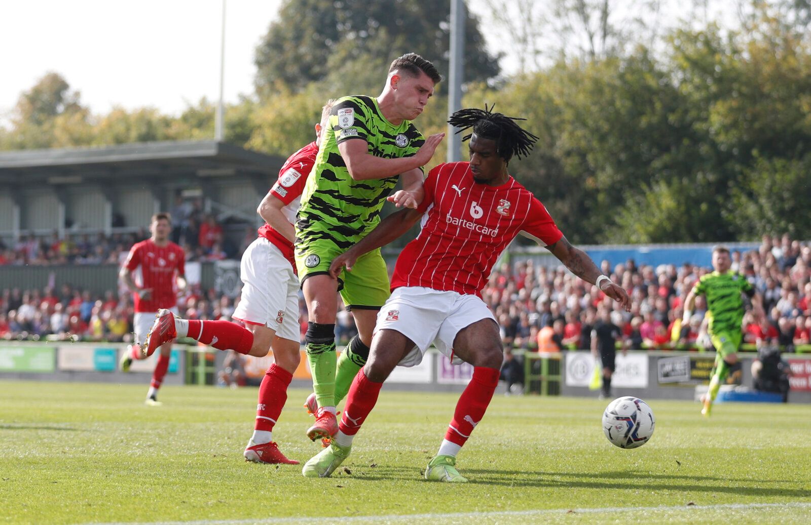 Soccer Football - League Two - Forest Green Rovers v Swindon Town - The New Lawn Stadium, Nailsworth, Britain - October 9, 2021 Forest Green Rovers’ Mathew Stevens in action with Swindon Town’s Akinwale Odimayo Action Images/Matthew Childs EDITORIAL USE ONLY. No use with unauthorized audio, video, data, fixture lists, club/league logos or 'live' services. Online in-match use limited to 75 images, no video emulation. No use in betting, games or single club /league/player publications.  Please con