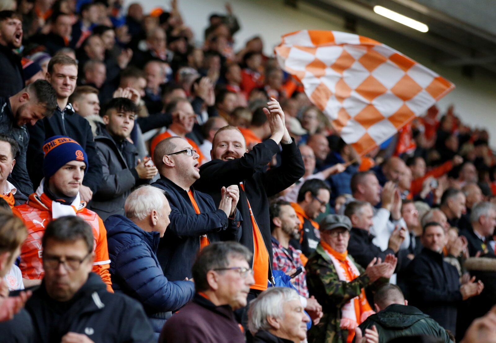 Soccer Football - Championship - Blackpool v Preston North End - Bloomfield Road, Blackpool, Britain - October 23, 2021 Blackpool fans celebrate after the match Action Images/Ed Sykes  EDITORIAL USE ONLY. No use with unauthorized audio, video, data, fixture lists, club/league logos or 