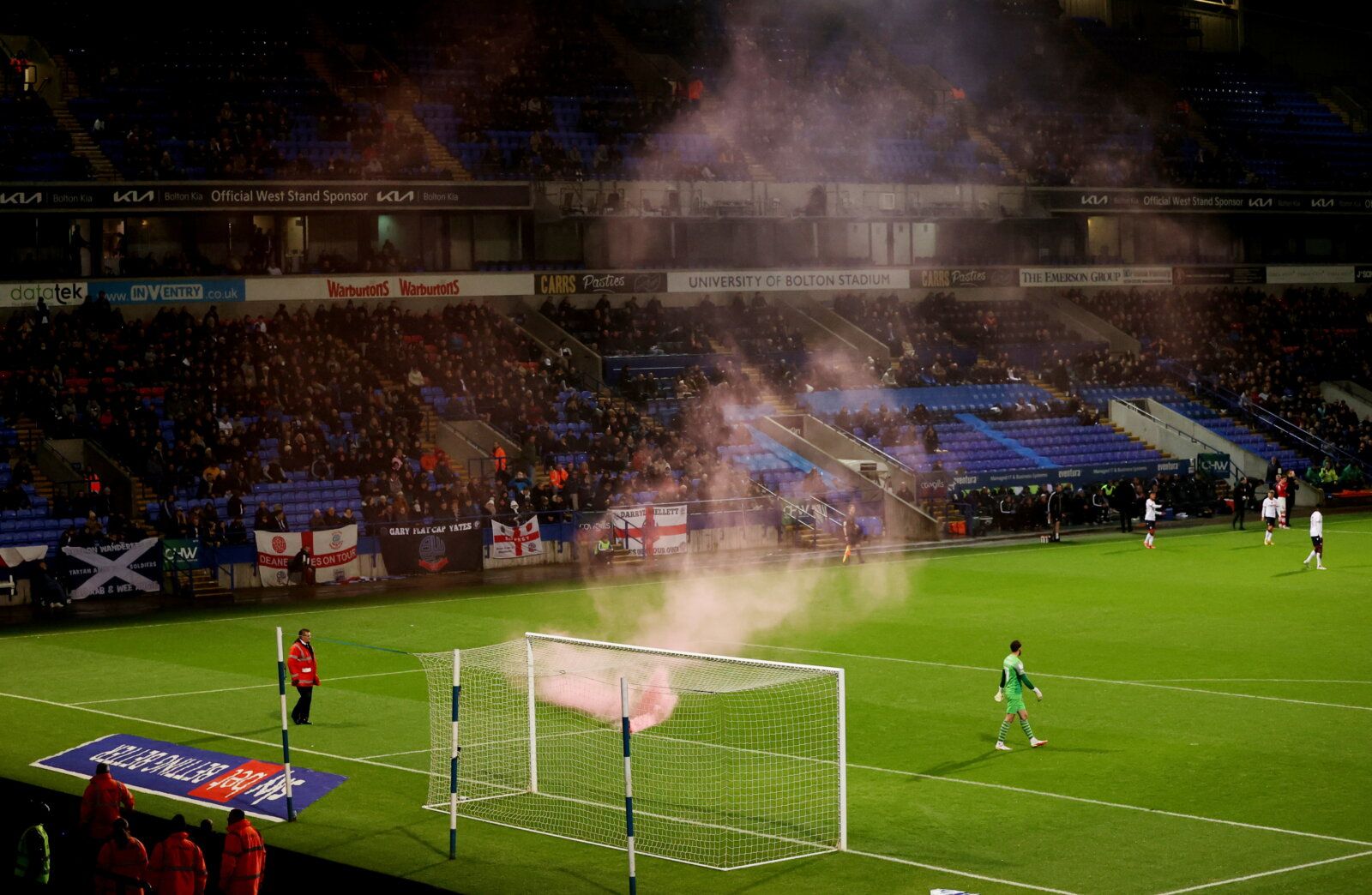 Soccer Football - League One - Bolton Wanderers v Crewe Alexandra - University of Bolton Stadium, Bolton, Britain - November 12, 2021  The match is stopped after a flare is thrown onto the pitch   Action Images/Molly Darlington  EDITORIAL USE ONLY. No use with unauthorized audio, video, data, fixture lists, club/league logos or 