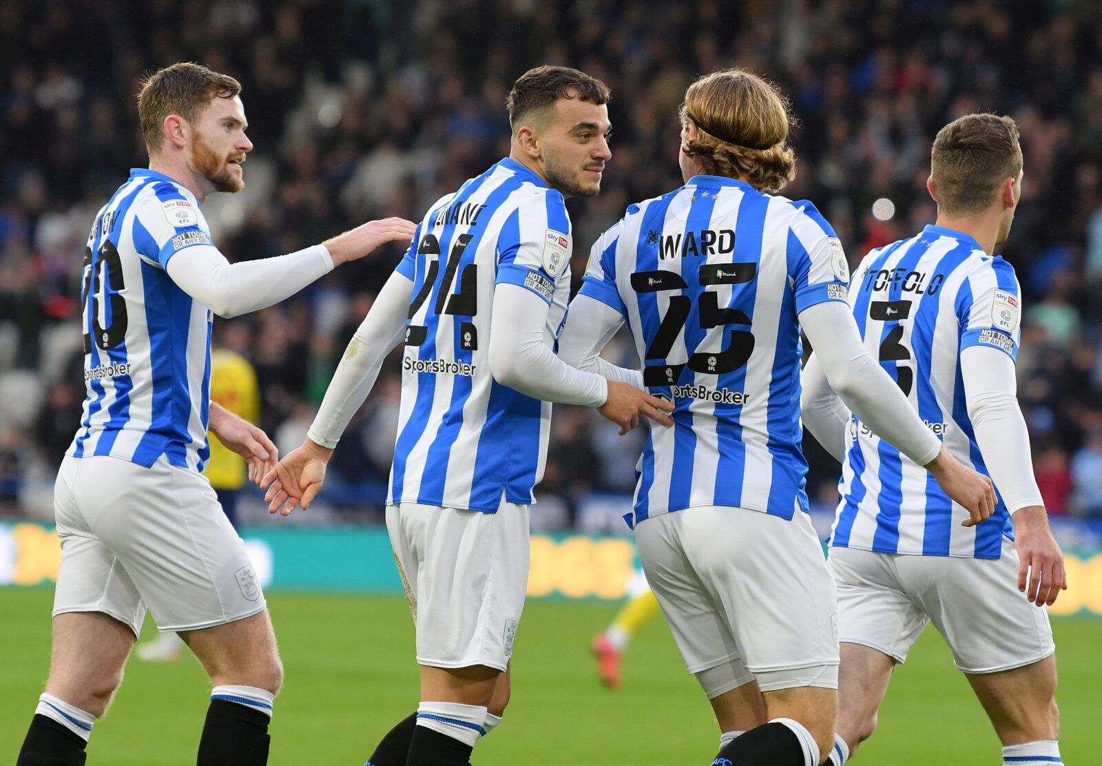 Soccer Football - Championship - Huddersfield Town v West Bromwich Albion - John Smith's Stadium, Huddersfield, Britain - November 20, 2021 Huddersfield Town's Danel Sinani celebrates scoring their first goal with teammates  Paul Burrows/Action Images