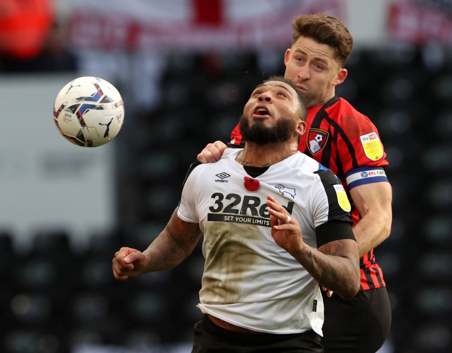 Soccer Football - Championship - Derby County v AFC Bournemouth - Pride Park, Derby, Britain - November 21, 2021 Derby County's Colin Kazim-Richards in action with Bournemouth's Gary Cahill  Molly Darlington/Action Images
