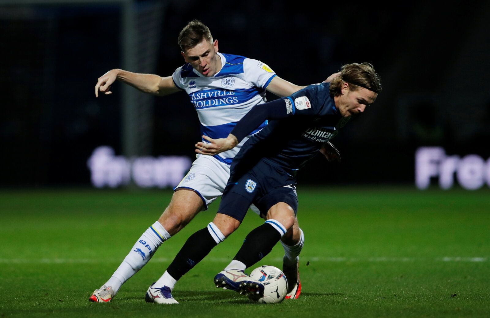 Soccer Football - Championship - Queens Park Rangers v Huddersfield Town - Loftus Road, London, Britain - November 24, 2021 Huddersfield Town's Danny Ward in action with Queens Park Rangers' Jimmy Dunne  Action Images/Andrew Couldridge  EDITORIAL USE ONLY. No use with unauthorized audio, video, data, fixture lists, club/league logos or 