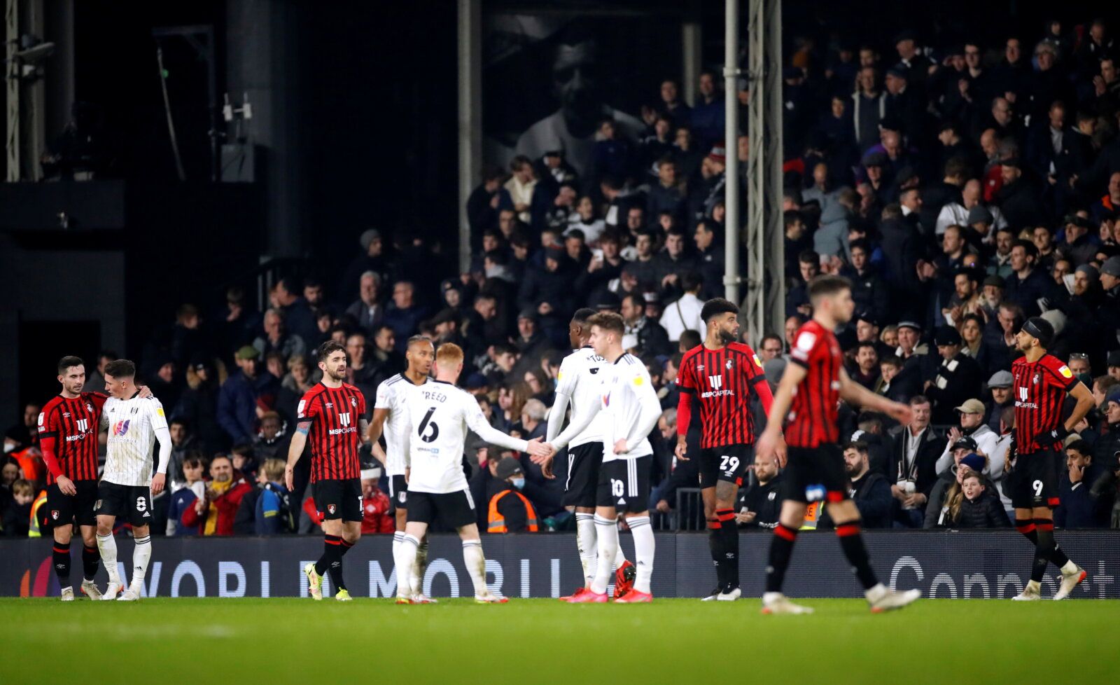 Soccer Football - Championship - Fulham v AFC Bournemouth - Craven Cottage, London, Britain - December 3, 2021 Players shake hands at the end of the match Action Images/Andrew Boyers  EDITORIAL USE ONLY. No use with unauthorized audio, video, data, fixture lists, club/league logos or 