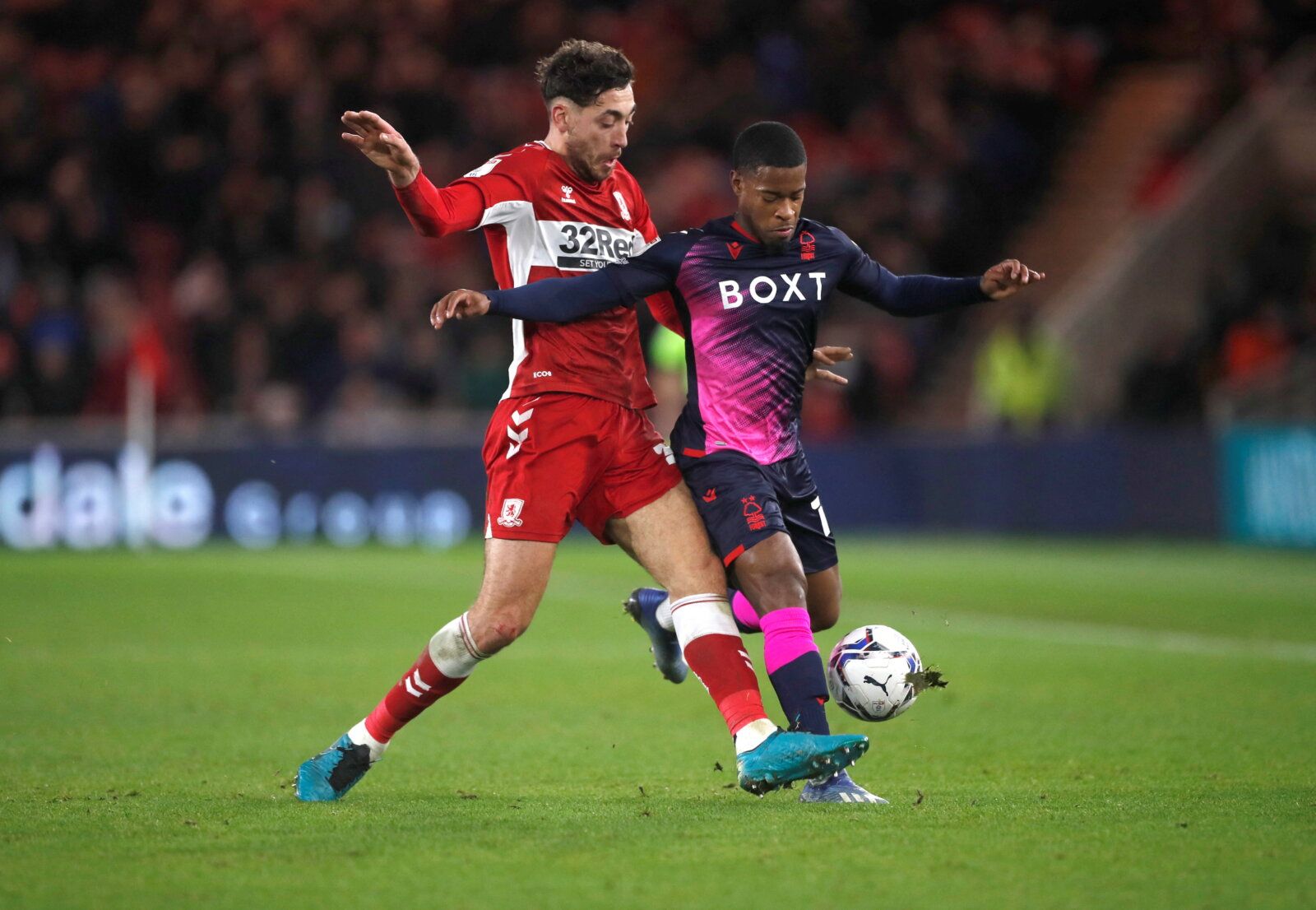 Soccer Football - Championship - Middlesbrough v Nottingham Forest - Riverside Stadium, Middlesbrough, Britain - December 26, 2021  Nottingham Forest's Xande Silva in action with Middlesbrough's Matty Crooks   Action Images/Lee Smith  EDITORIAL USE ONLY. No use with unauthorized audio, video, data, fixture lists, club/league logos or 