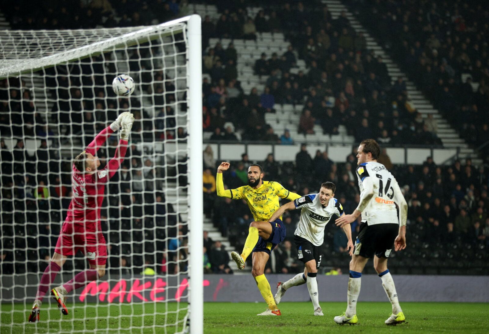 Soccer Football - Championship - Derby County v West Bromwich Albion - Pride Park, Derby, Britain - December 27, 2021 Derby County's Ryan Allsop saves a shot on goal by West Bromwich Albion's Kyle Bartley   Action Images/Molly Darlington  EDITORIAL USE ONLY. No use with unauthorized audio, video, data, fixture lists, club/league logos or 