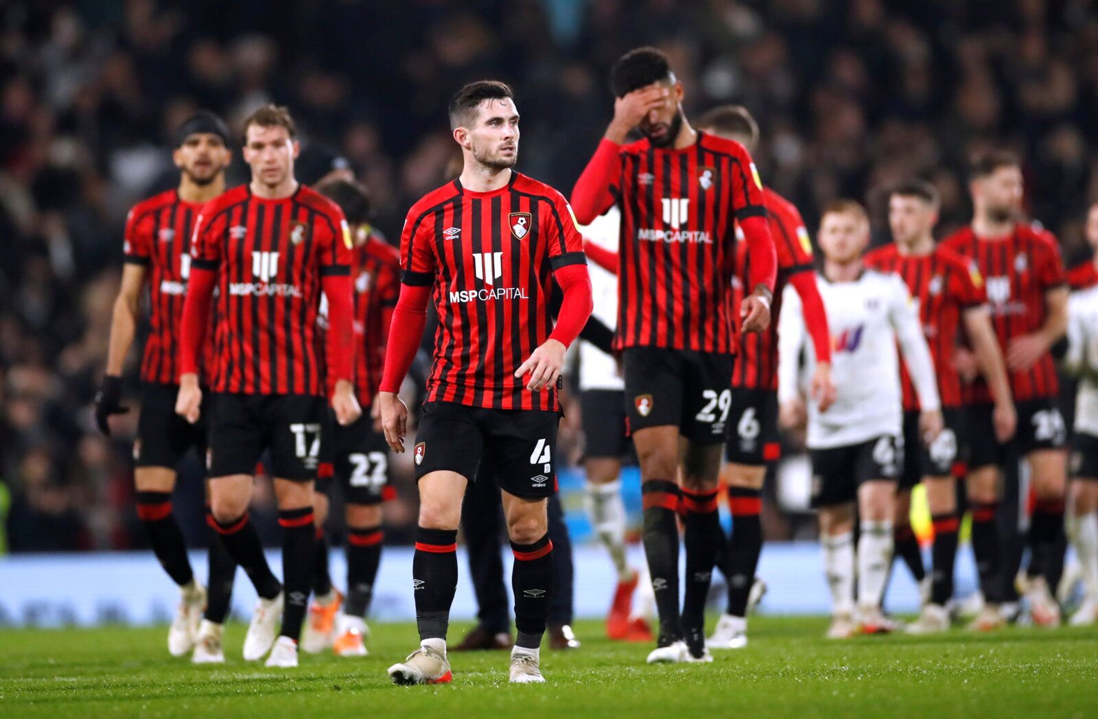 Soccer Football - Championship - Fulham v AFC Bournemouth - Craven Cottage, London, Britain - December 3, 2021 Bournemouth's players at the end of the match Action Images/Andrew Boyers  EDITORIAL USE ONLY. No use with unauthorized audio, video, data, fixture lists, club/league logos or 