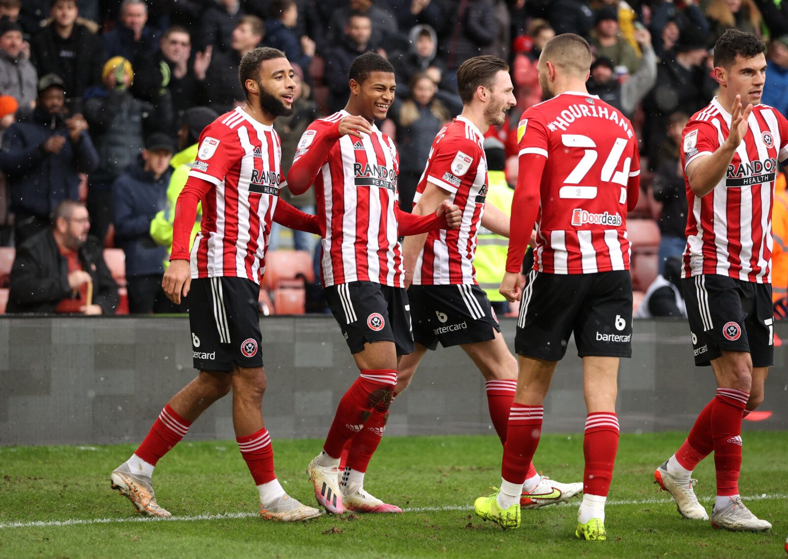 Soccer Football - Championship - Sheffield United v Bristol City - Bramall Lane, Sheffield, Britain - November 28, 2021 Sheffield United's Rhian Brewster celebrates scoring their first goal with teammates Action Images/Molly Darlington EDITORIAL USE ONLY. No use with unauthorized audio, video, data, fixture lists, club/league logos or 'live' services. Online in-match use limited to 75 images, no video emulation. No use in betting, games or single club /league/player publications.  Please contact