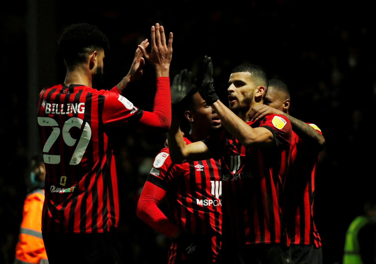 Soccer Football - Championship - Queens Park Rangers v AFC Bournemouth - Loftus Road, London, Britain - December 27, 2021 AFC Bournemouth's Dominic Solanke celebrates with Philip Billing after the match  Action Images/Andrew Boyers  EDITORIAL USE ONLY. No use with unauthorized audio, video, data, fixture lists, club/league logos or 