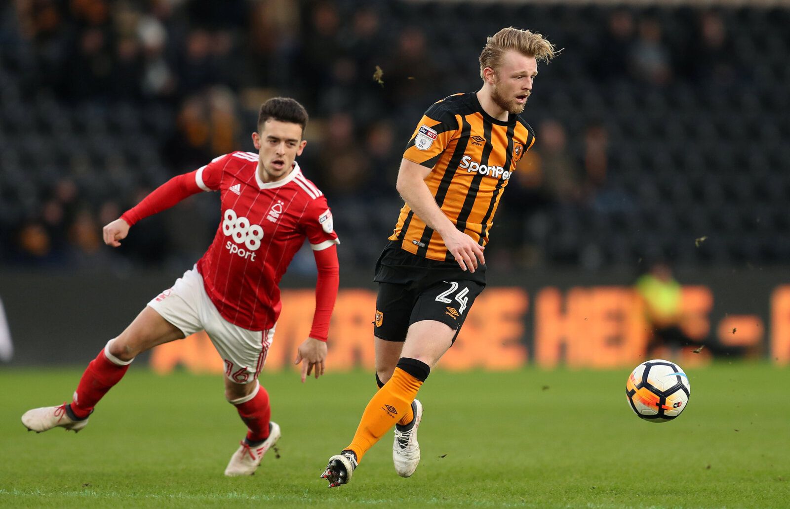 Soccer Football - FA Cup Fourth Round - Hull City vs Nottingham Forest - KCOM Stadium, Hull, Britain - January 27, 2018   Hull City’s Max Clark in action with Nottingham Forest’s Zach Clough   Action Images/John Clifton