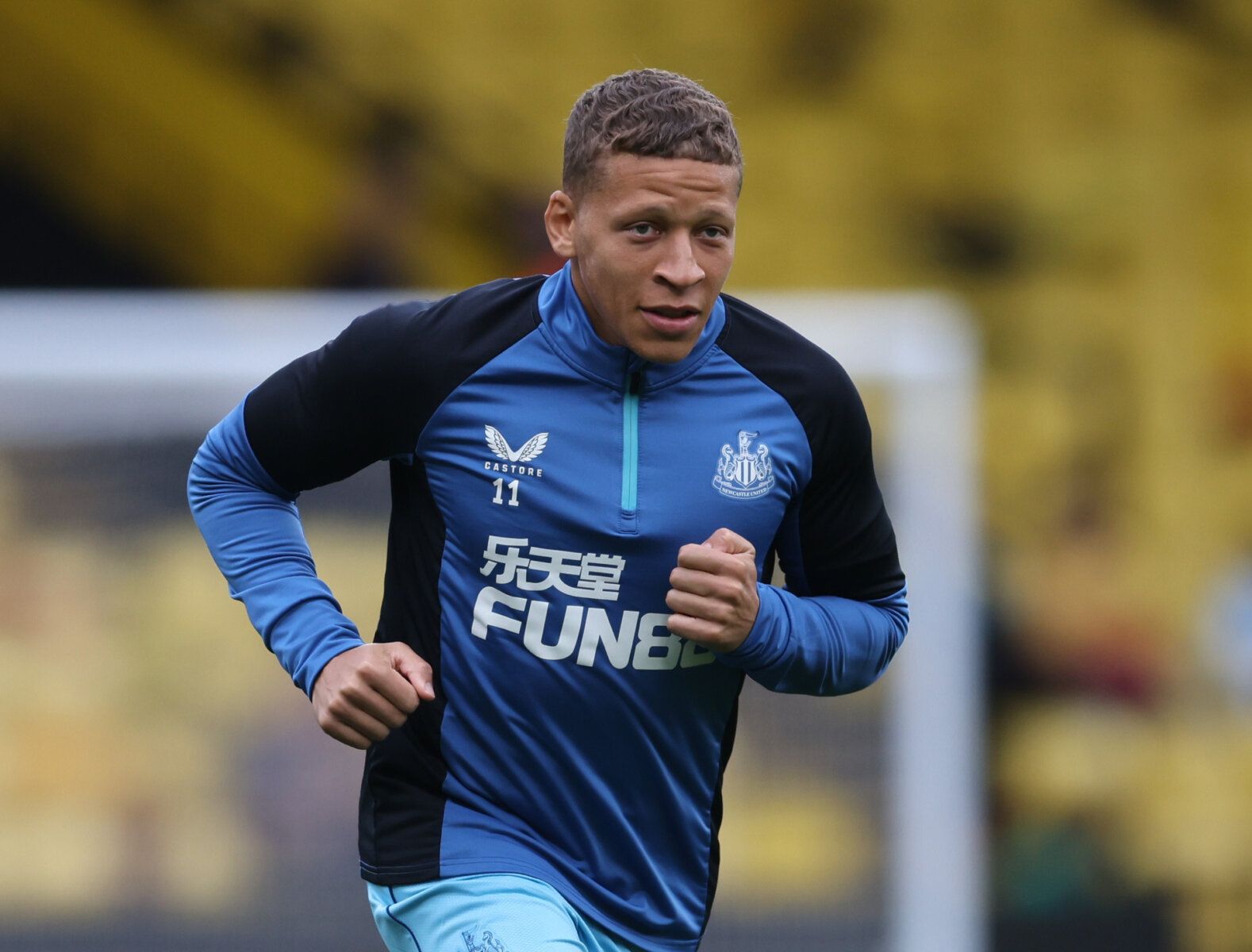 Soccer Football - Premier League - Watford v Newcastle United - Vicarage Road, Watford, Britain - September 25, 2021 Newcastle United's Dwight Gayle during the warm up before the match REUTERS/David Klein EDITORIAL USE ONLY. No use with unauthorized audio, video, data, fixture lists, club/league logos or 'live' services. Online in-match use limited to 75 images, no video emulation. No use in betting, games or single club /league/player publications.  Please contact your account representative fo