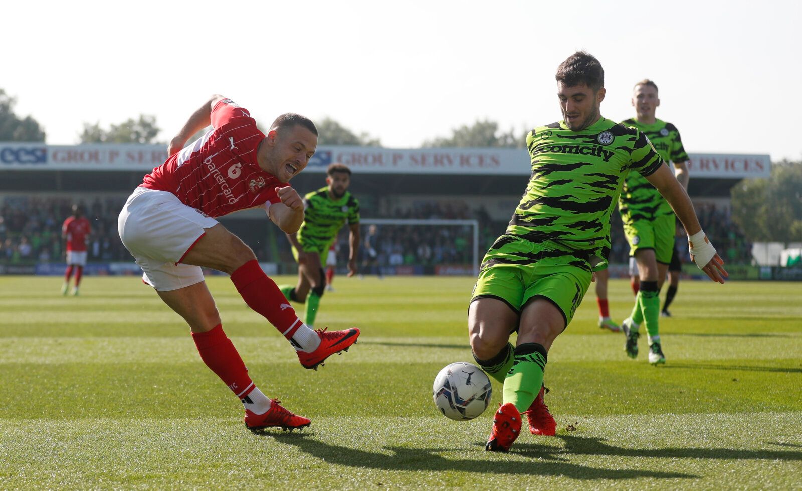 Soccer Football - League Two - Forest Green Rovers v Swindon Town - The New Lawn Stadium, Nailsworth, Britain - October 9, 2021 Forest Green Rovers’ Jordan Moore Taylor in action with Swindon Town’s Jack Payne Action Images/Matthew Childs EDITORIAL USE ONLY. No use with unauthorized audio, video, data, fixture lists, club/league logos or 'live' services. Online in-match use limited to 75 images, no video emulation. No use in betting, games or single club /league/player publications.  Please cont
