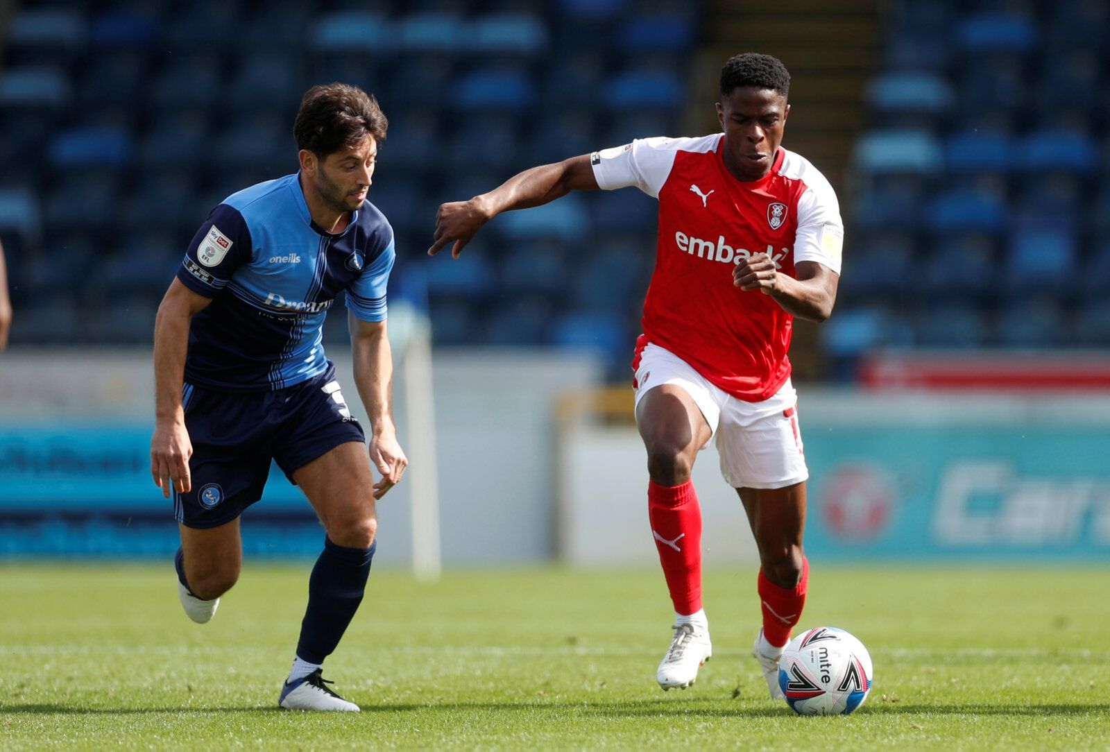 Soccer Football - Championship - Wycombe Wanderers v Rotherham United - Adams Park, High Wycombe, Britain - September 12, 2020 Wycombe WanderersÕ Joe Jacobson in action with Rotherham UnitedÕs Chiedozie Ogbene  Action Images/Matthew Childs  EDITORIAL USE ONLY. No use with unauthorized audio, video, data, fixture lists, club/league logos or 