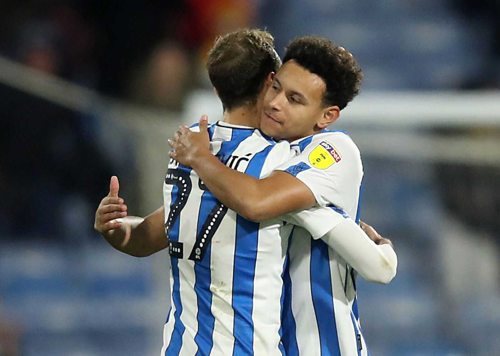 Soccer Football - Championship - Huddersfield Town v Blackburn Rovers - John Smith's Stadium, Huddersfield, Britain - December 29, 2019   Huddersfield Town's Jon Gorenc Stankovic and Rarmani Edmonds-Green celebrate after the match   Action Images/John Clifton    EDITORIAL USE ONLY. No use with unauthorized audio, video, data, fixture lists, club/league logos or 