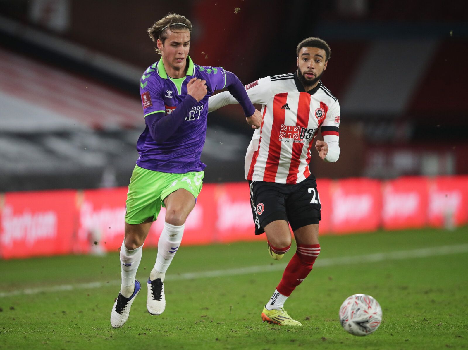 Soccer Football -  FA Cup - Fifth Round - Sheffield United v Bristol City  - Bramall Lane, Sheffield, Britain - February 10, 2021 Bristol City's Ryley Towler in action with Sheffield United's Jayden Bogle Action Images via Reuters/Molly Darlington