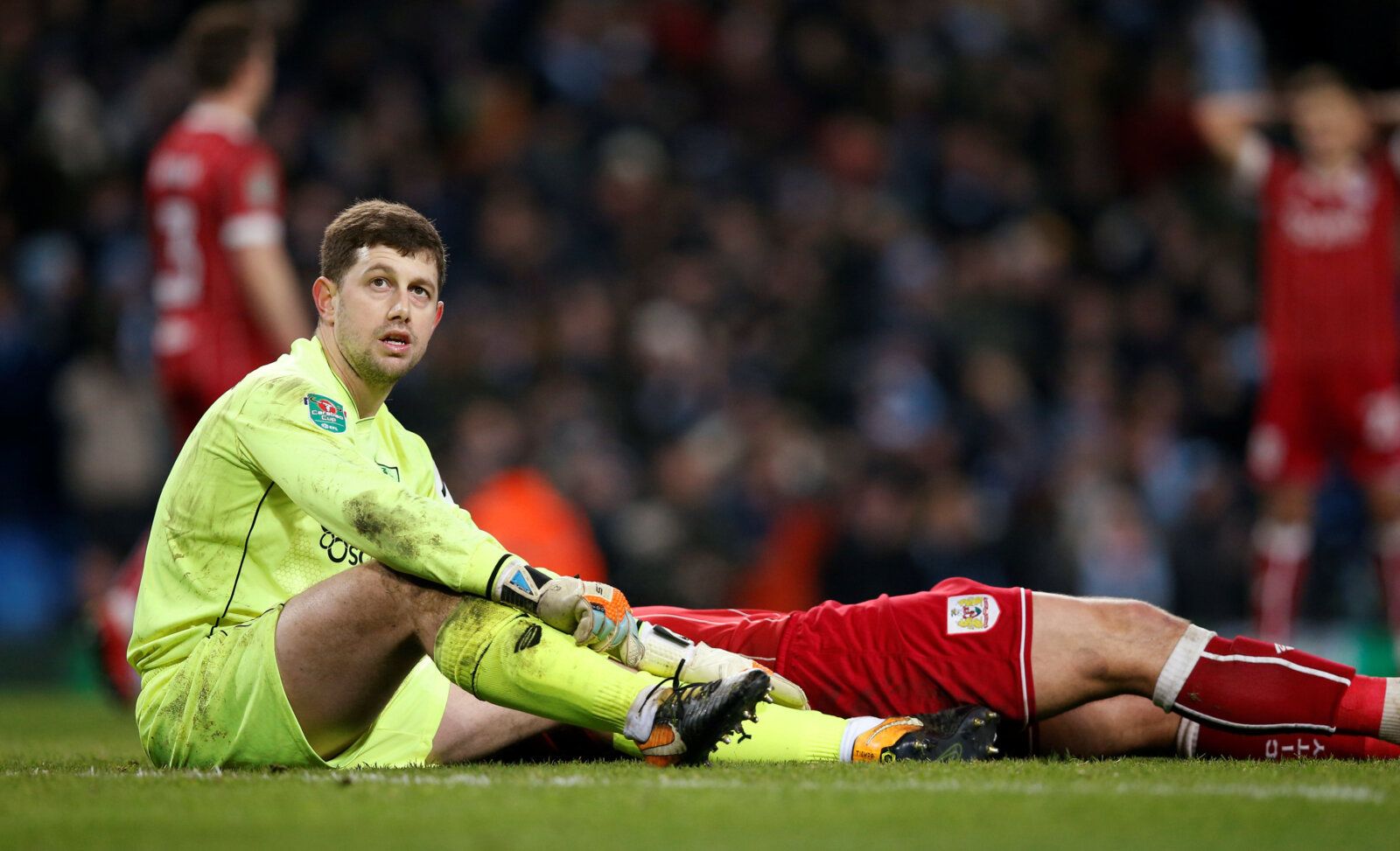 Soccer Football - Carabao Cup Semi Final First Leg - Manchester City vs Bristol City - Etihad Stadium, Manchester, Britain - January 9, 2018   Bristol City's Frank Fielding looks dejected after Manchester City's second goal    REUTERS/Andrew Yates    EDITORIAL USE ONLY. No use with unauthorized audio, video, data, fixture lists, club/league logos or 