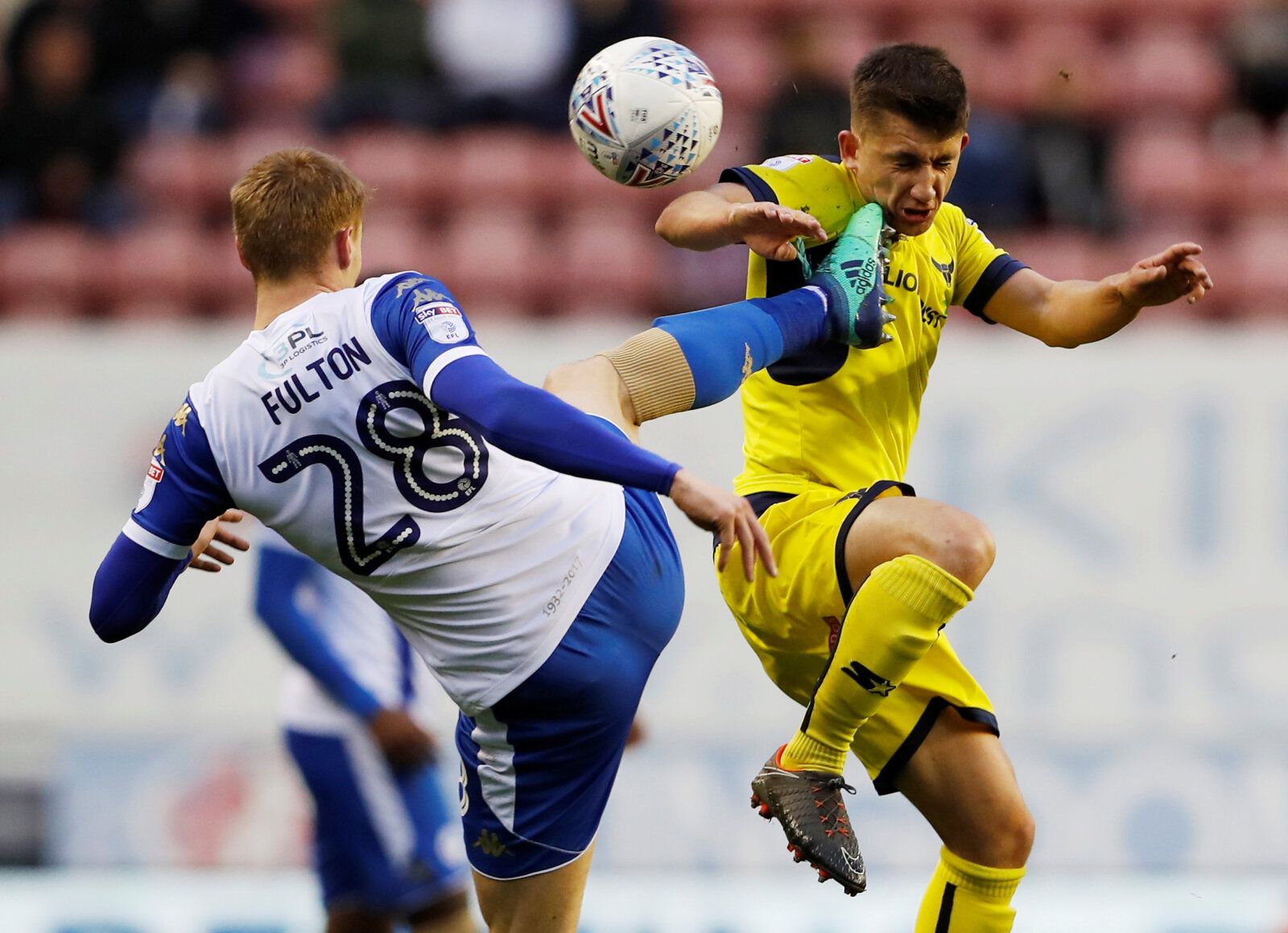 Soccer Football - League One - Wigan Athletic vs Oxford United - DW Stadium, Wigan, Britain - April 17, 2018   Oxford United's Cameron Brannagan in action with Wigan Athletic's Jay Fulton   Action Images/Lee Smith    EDITORIAL USE ONLY. No use with unauthorized audio, video, data, fixture lists, club/league logos or 