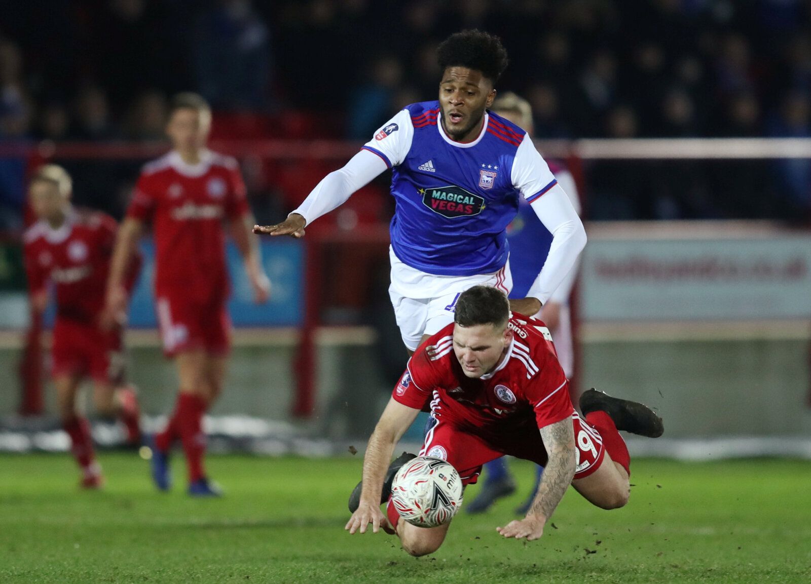 Soccer Football - FA Cup Third Round - Accrington Stanley v Ipswich Town - Wham Stadium, Accrington, Britain - January 5, 2019  Accrington Stanley's Billy Kee in action with Ipswich Town's Ellis Harrison          Action Images/John Clifton