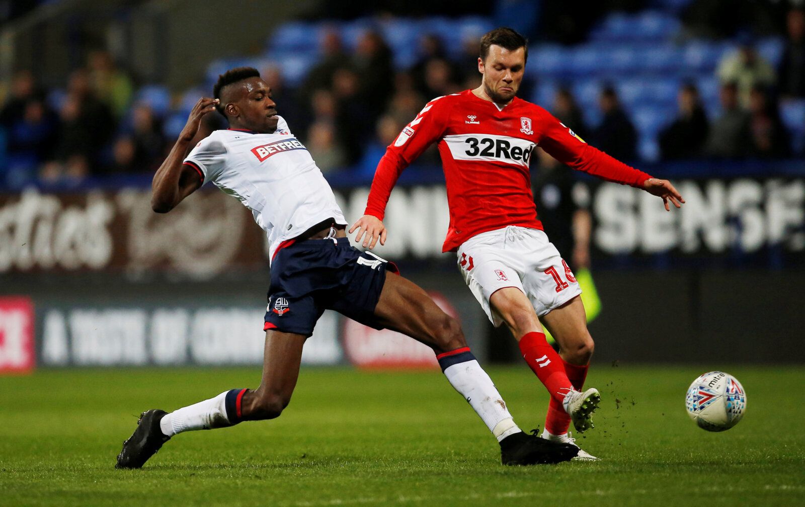 Soccer Football - Championship - Bolton Wanderers v Middlesbrough - University of Bolton Stadium, Bolton, Britain - April 9, 2019   Bolton Wanderers' Sammy Ameobi in action with Middlesbrough's Jonathan Howson   Action Images/Craig Brough    EDITORIAL USE ONLY. No use with unauthorized audio, video, data, fixture lists, club/league logos or 