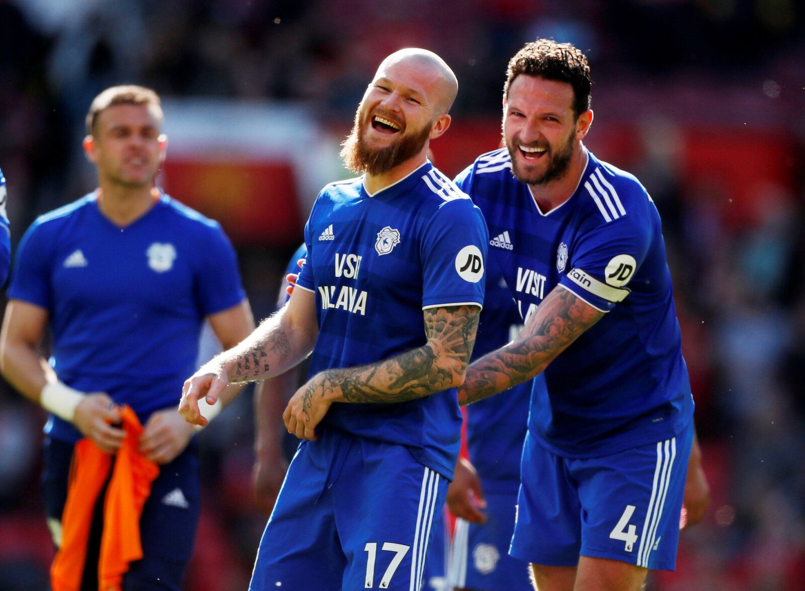 Soccer Football - Premier League - Manchester United v Cardiff City - Old Trafford, Manchester, Britain - May 12, 2019  Cardiff City's Aron Gunnarsson celebrates after the match with Sean Morrison    Action Images via Reuters/Lee Smith  EDITORIAL USE ONLY. No use with unauthorized audio, video, data, fixture lists, club/league logos or 