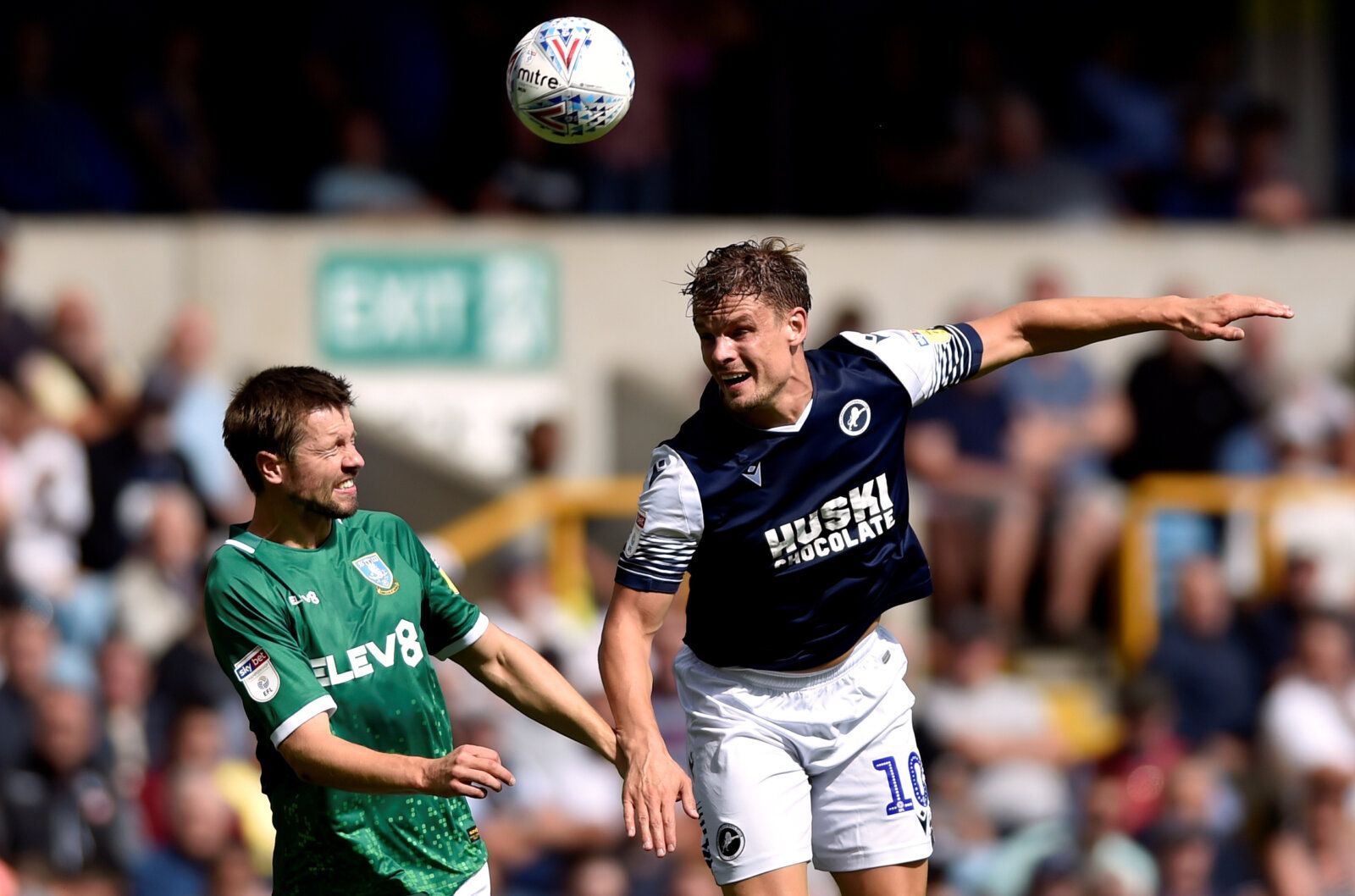 Soccer Football - Championship - Millwall v Sheffield Wednesday - The Den, London, Britain - August 17, 2019  Sheffield Wednesday's Julian Borner in action with Millwall's Matt Smith  Action Images/Adam Holt  EDITORIAL USE ONLY. No use with unauthorized audio, video, data, fixture lists, club/league logos or 