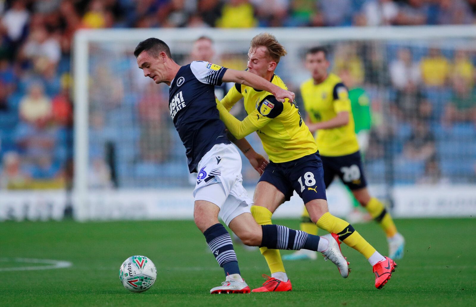 Soccer Football - Carabao Cup Second Round - Oxford United v Millwall - Kassam Stadium, Oxford, Britain - August 27, 2019   Oxford United's Mark Sykes in action with Millwall's Shaun Williams   Action Images via Reuters/Andrew Couldridge    EDITORIAL USE ONLY. No use with unauthorized audio, video, data, fixture lists, club/league logos or 