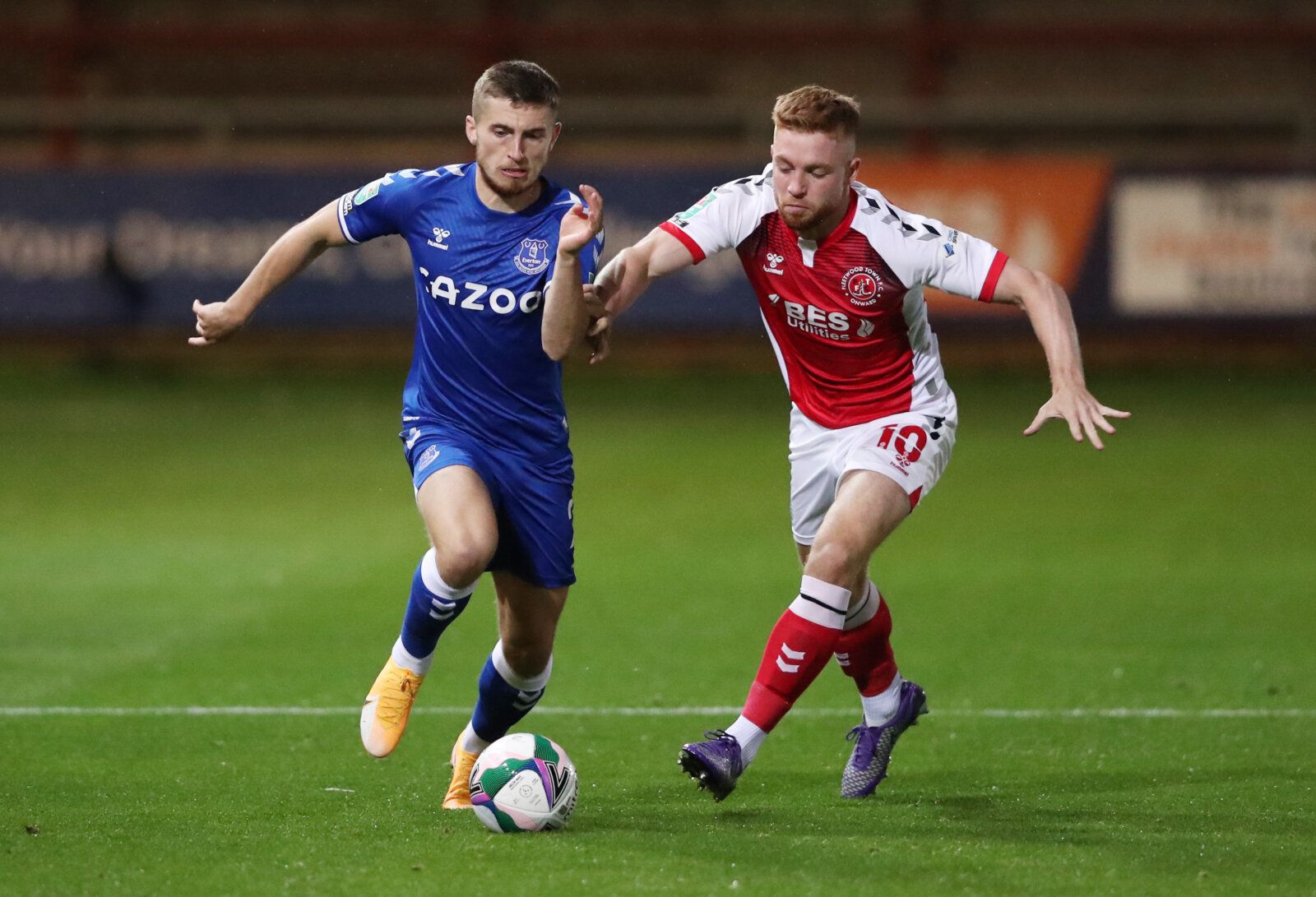 Soccer Football - Carabao Cup Third Round - Fleetwood Town v Everton - Highbury Stadium, Fleetwood, Britain - September 23, 2020 Fleetwood Town's Callum Camps in action with Everton's Jonjoe Kenny Pool via REUTERS/Alex Livesey EDITORIAL USE ONLY. No use with unauthorized audio, video, data, fixture lists, club/league logos or 'live' services. Online in-match use limited to 75 images, no video emulation. No use in betting, games or single club/league/player publications.  Please contact your acco