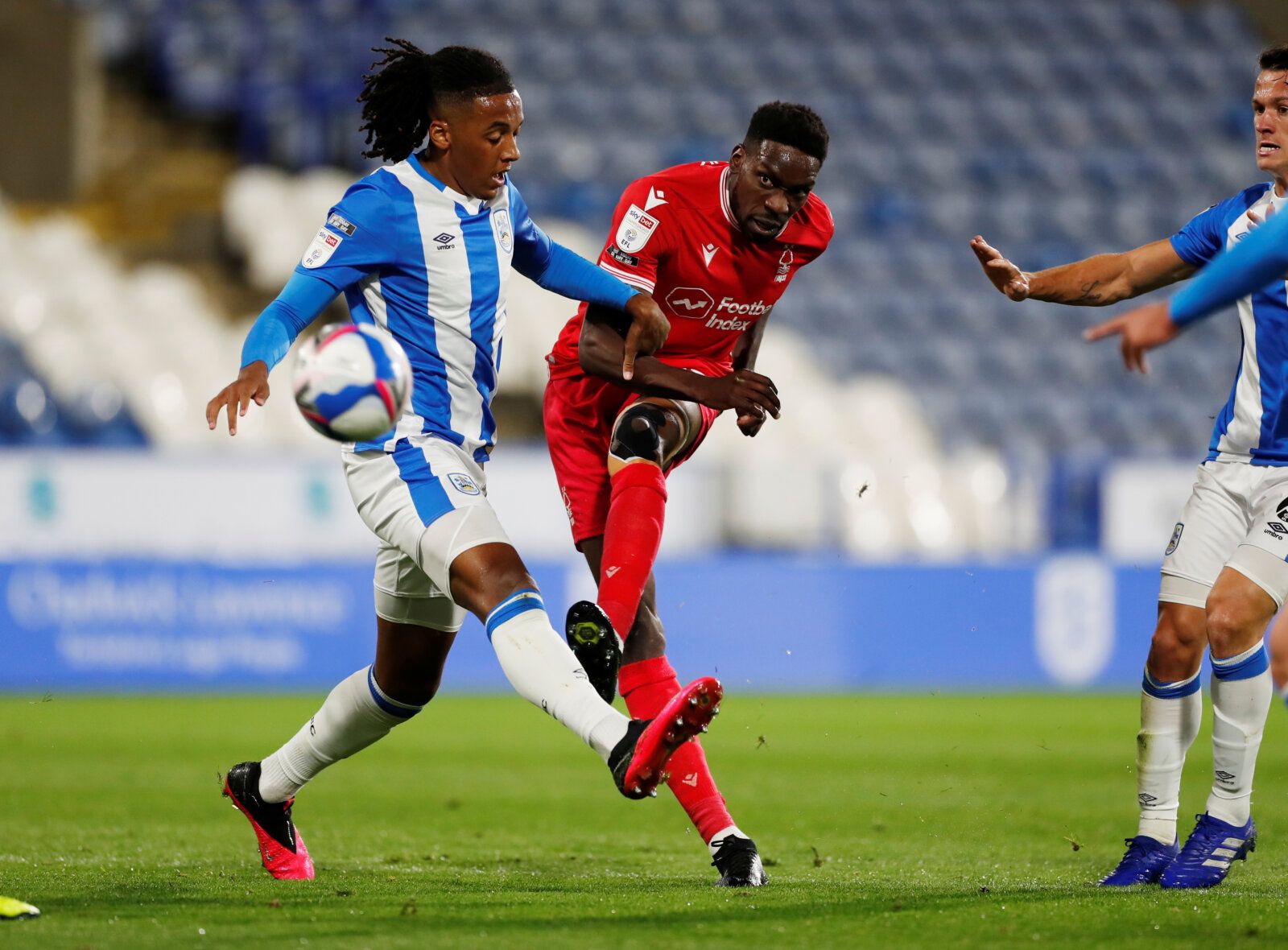 Soccer Football - Championship - Huddersfield Town v Nottingham Forest - John Smith's Stadium, Huddersfield, Britain - September 25, 2020   Nottingham Forests' Sammy Ameobi in action with Huddersfield Towns' Romoney Crichlow-Noble   Action Images/Lee Smith    EDITORIAL USE ONLY. No use with unauthorized audio, video, data, fixture lists, club/league logos or 