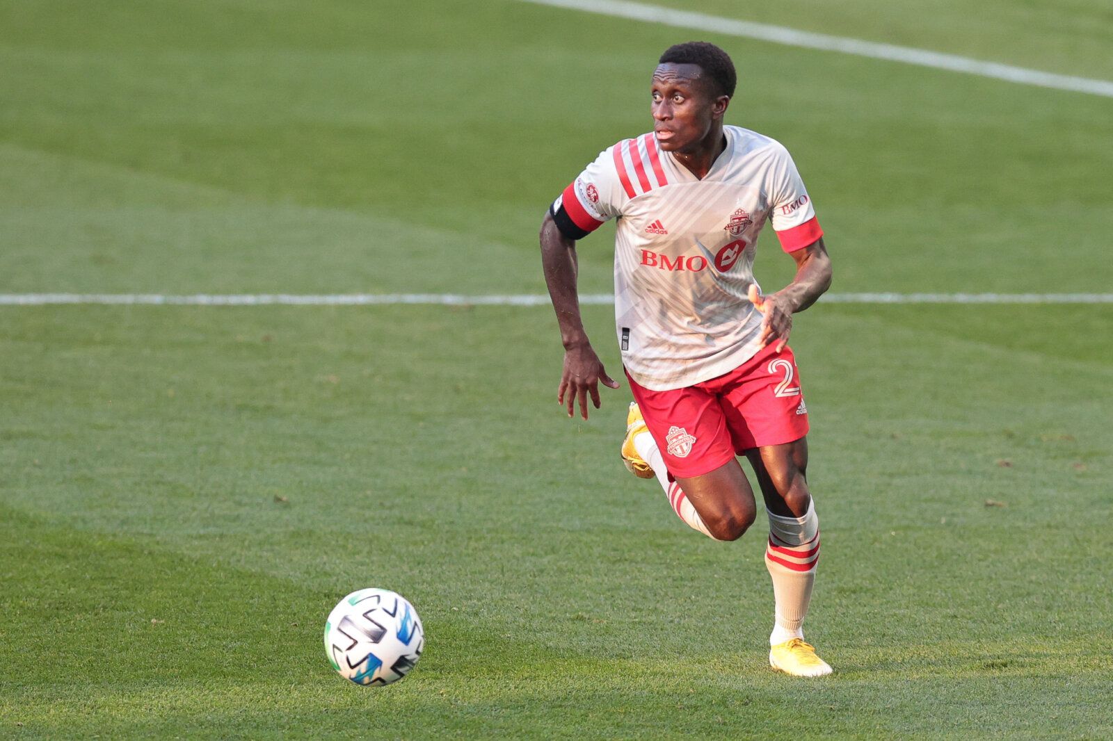 Nov 8, 2020; Harrison, New Jersey, USA; Toronto FC midfielder Richie Laryea (22) controls the ball against the New York Red Bulls during the first half at Red Bull Arena. Mandatory Credit: Vincent Carchietta-USA TODAY Sports