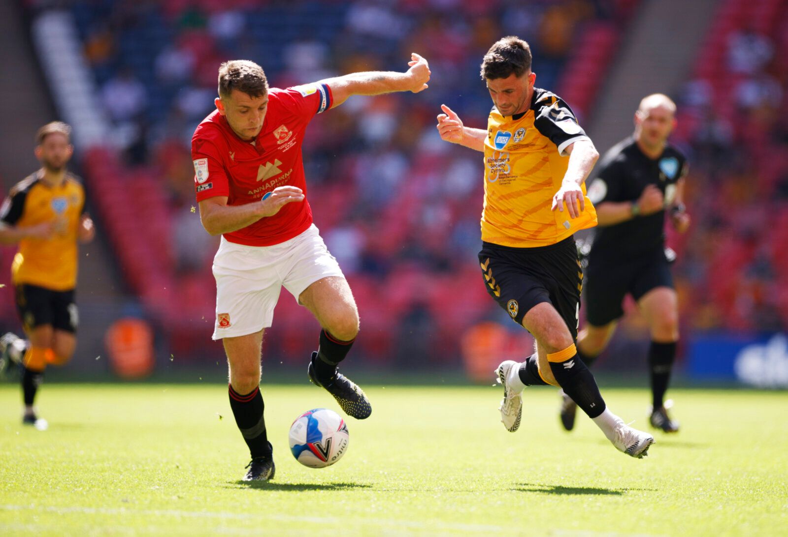 Soccer Football - League Two Play-Off Final - Morecambe v Newport County - Wembley Stadium, London, Britain - May 31, 2021 Morecambe's Sam Lavelle in action with Newport County's Padraig Amond Action Images/John Sibley EDITORIAL USE ONLY. No use with unauthorized audio, video, data, fixture lists, club/league logos or 'live' services. Online in-match use limited to 75 images, no video emulation. No use in betting, games or single club /league/player publications.  Please contact your account rep