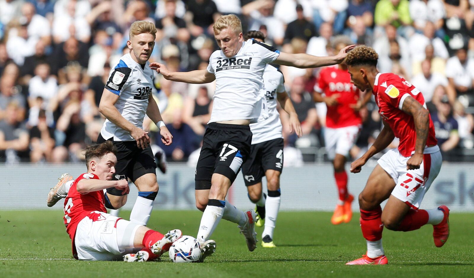 Soccer Football - Championship - Derby County v Nottingham Forest - Pride Park, Derby, Britain - August 28, 2021  Nottingham Forest's James Garner in action with Derby County's Louie Sibley   Action Images/Craig Brough