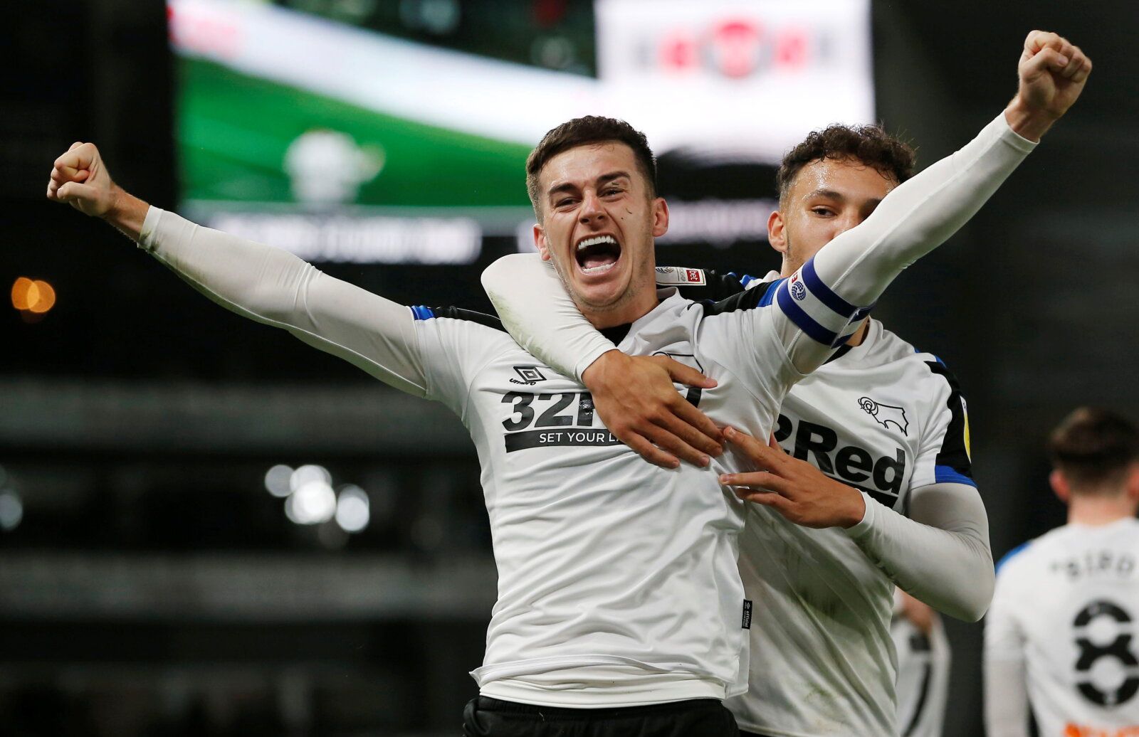 Soccer Football - Championship - Derby County v Luton Town - Pride Park, Derby, Britain - October 19, 2021  Derby County's Tom Lawrence celebrates scoring their first goal with teammates    Action Images/Craig Brough    EDITORIAL USE ONLY. No use with unauthorized audio, video, data, fixture lists, club/league logos or 