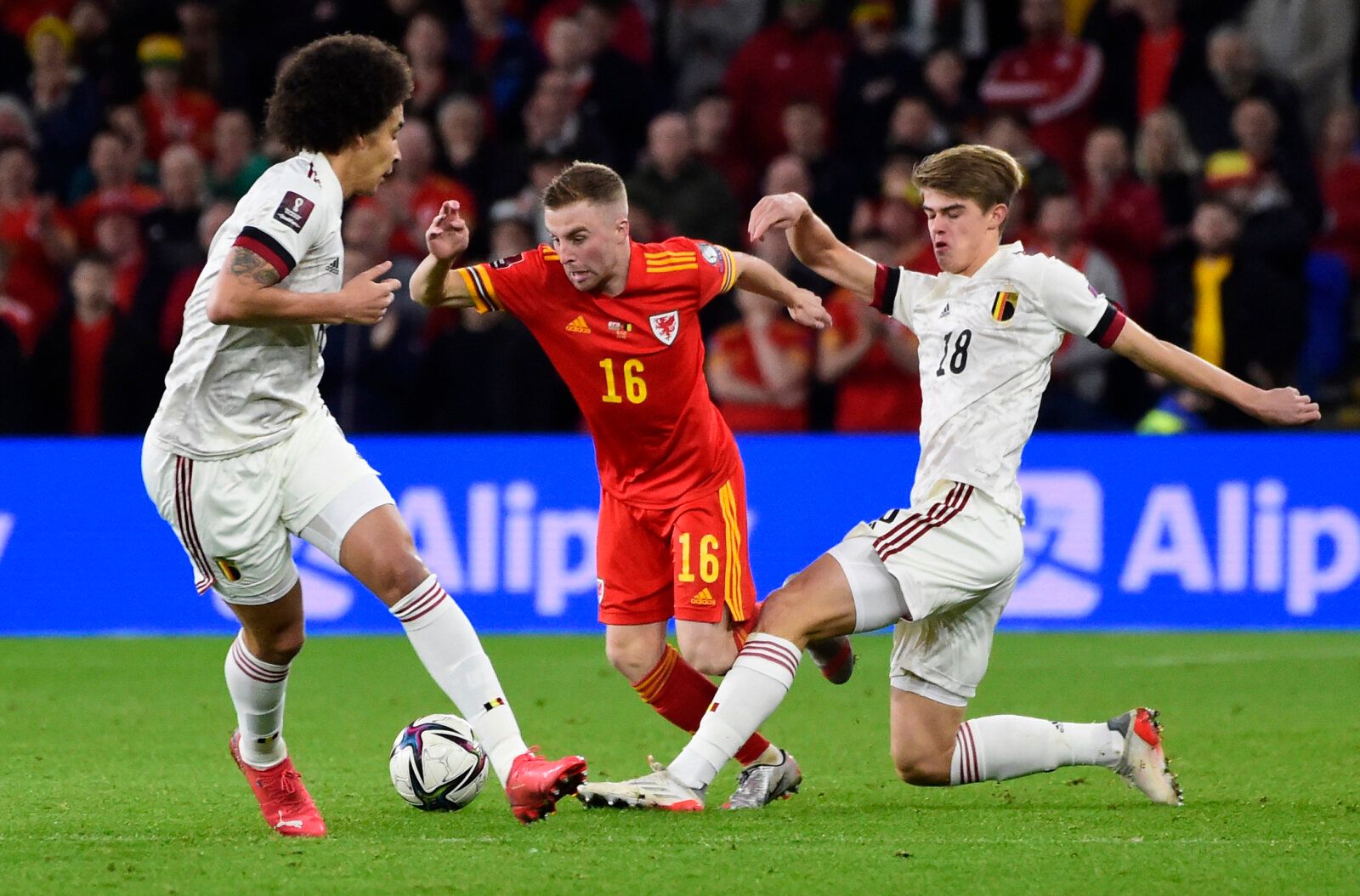 Soccer Football - World Cup - UEFA Qualifiers - Group E - Wales v Belgium - Cardiff City Stadium, Cardiff, Wales, Britain - November 16, 2021 Wales' Joe Morrell in action with Belgium's Axel Witsel and Charles De Ketelaere REUTERS/Rebecca Naden