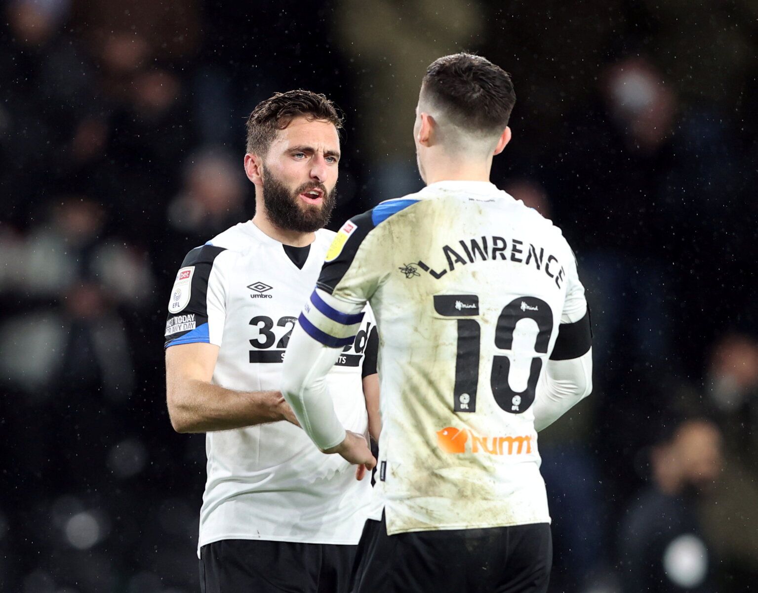 Soccer Football - Championship - Derby County v Blackpool - Pride Park, Derby, Britain - December 11, 2021  Derby County's Graeme Shinnie and Tom Lawrence celebrate after Luke Plange scores their first goal  Action Images/Molly Darlington  EDITORIAL USE ONLY. No use with unauthorized audio, video, data, fixture lists, club/league logos or 