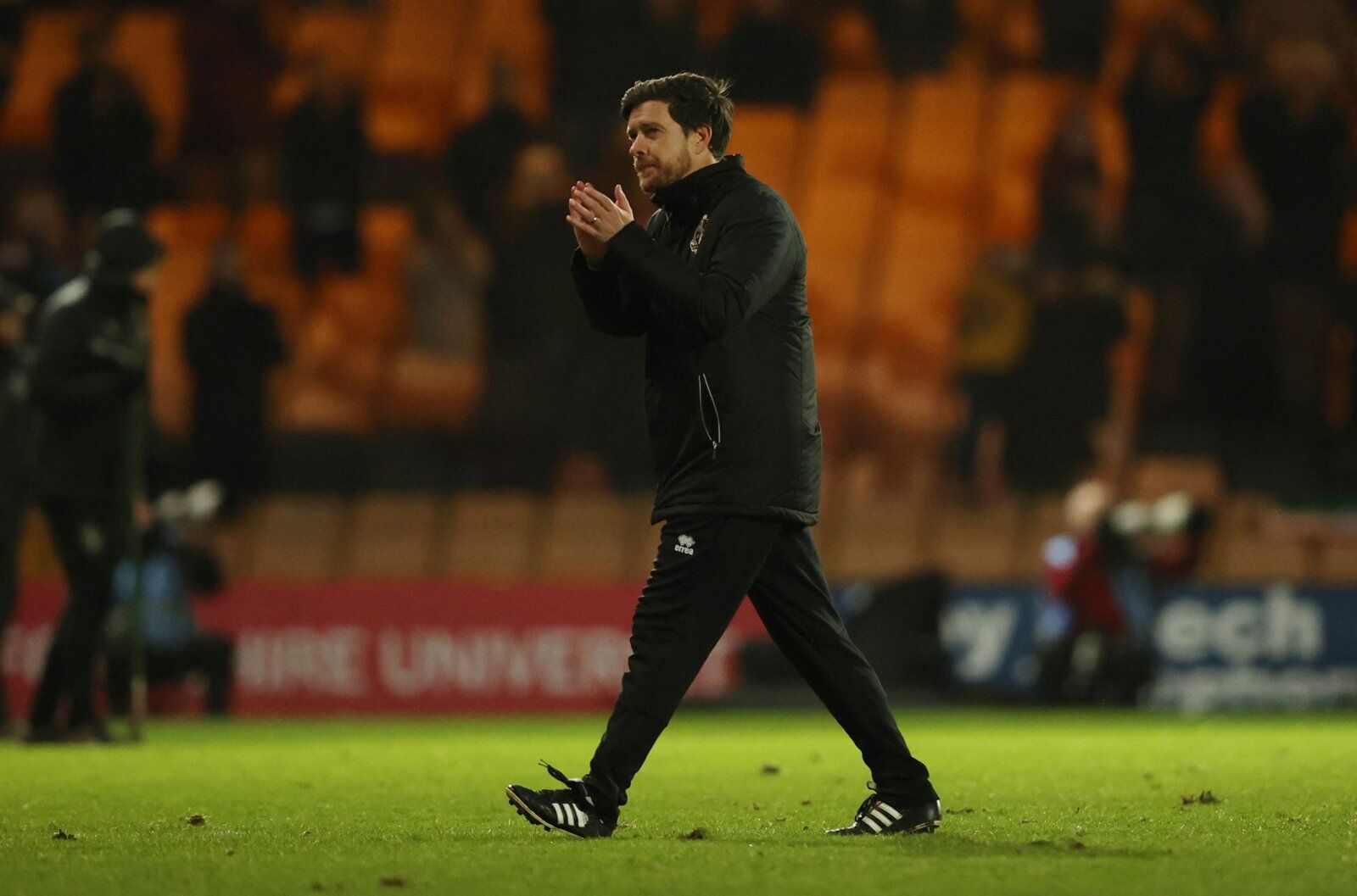 Soccer Football - FA Cup Third Round - Port Vale v Brentford - Vale Park, Stoke-on-Trent, Britain - January 8, 2022  Port Vale manager Darrell Clarke applauds fans after the match Action Images via Reuters/Molly Darlington