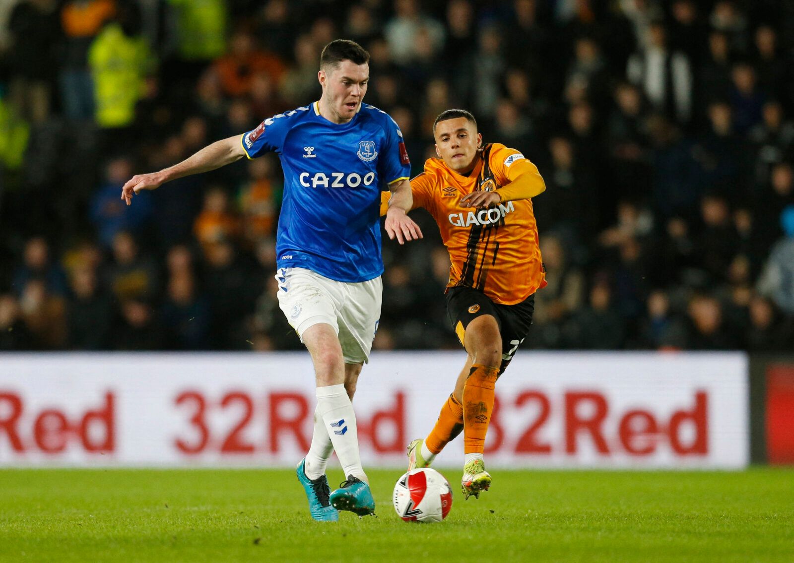 Soccer Football - FA Cup Third Round - Hull City v Everton - KCOM Stadium, Hull, Britain - January 8, 2022 Everton's Michael Keane in action with Hull City's Tyler Smith Action Images via Reuters/Ed Sykes