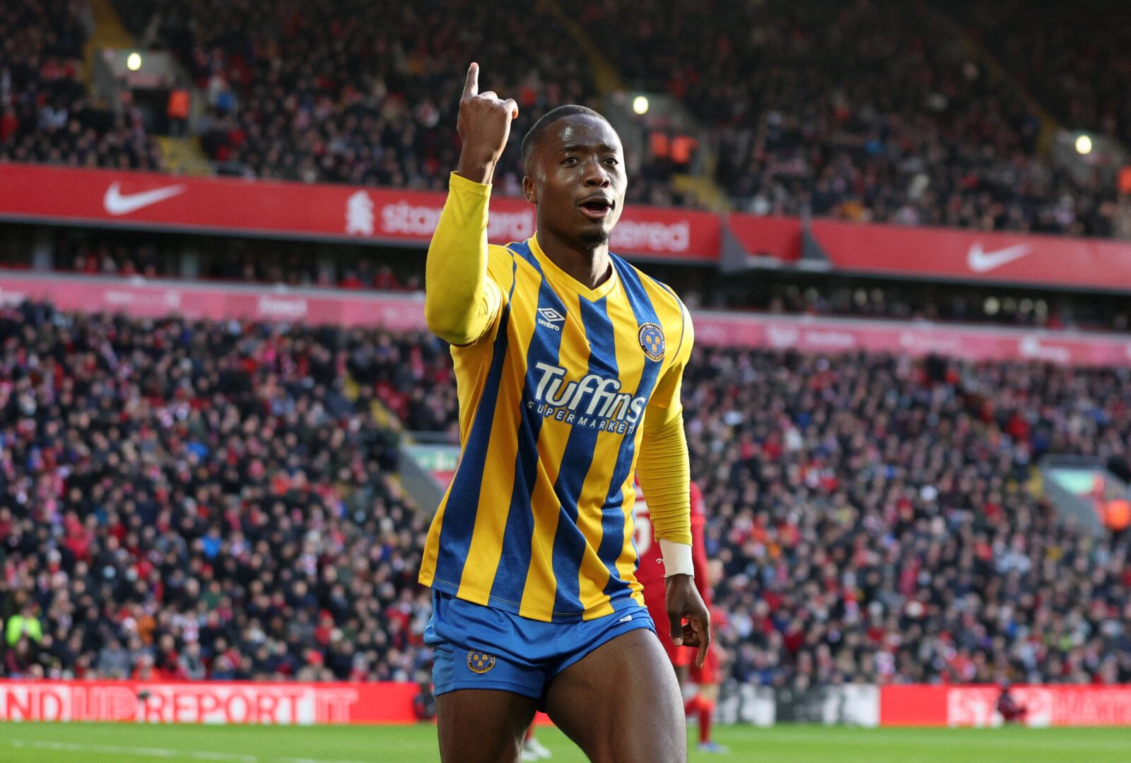 Soccer Football - FA Cup Third Round - Liverpool v Shrewsbury Town - Anfield, Liverpool, Britain - January 9, 2022 Shrewsbury Town's Daniel Udoh celebrates scoring their first goal REUTERS/Phil Noble