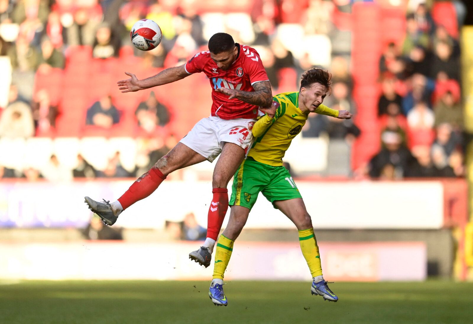 Soccer Football - FA Cup Third Round - Charlton Athletic v Norwich City - The Valley, London, Britain - January 9, 2022 Charlton Athletic's Ryan Inniss in action with Norwich City's Kieran Dowell REUTERS/Tony Obrien