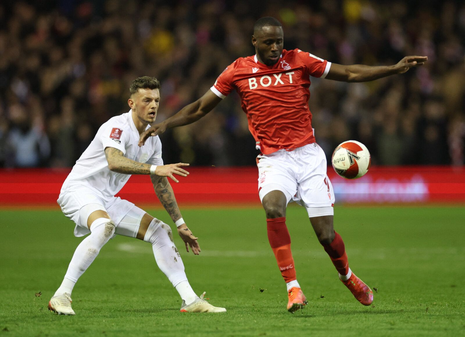 Soccer Football - FA Cup Third Round - Nottingham Forest v Arsenal - The City Ground, Nottingham, Britain - January 9, 2022 Nottingham Forest's Keinan Davis in action with Arsenal's Ben White Action Images via Reuters/Carl Recine