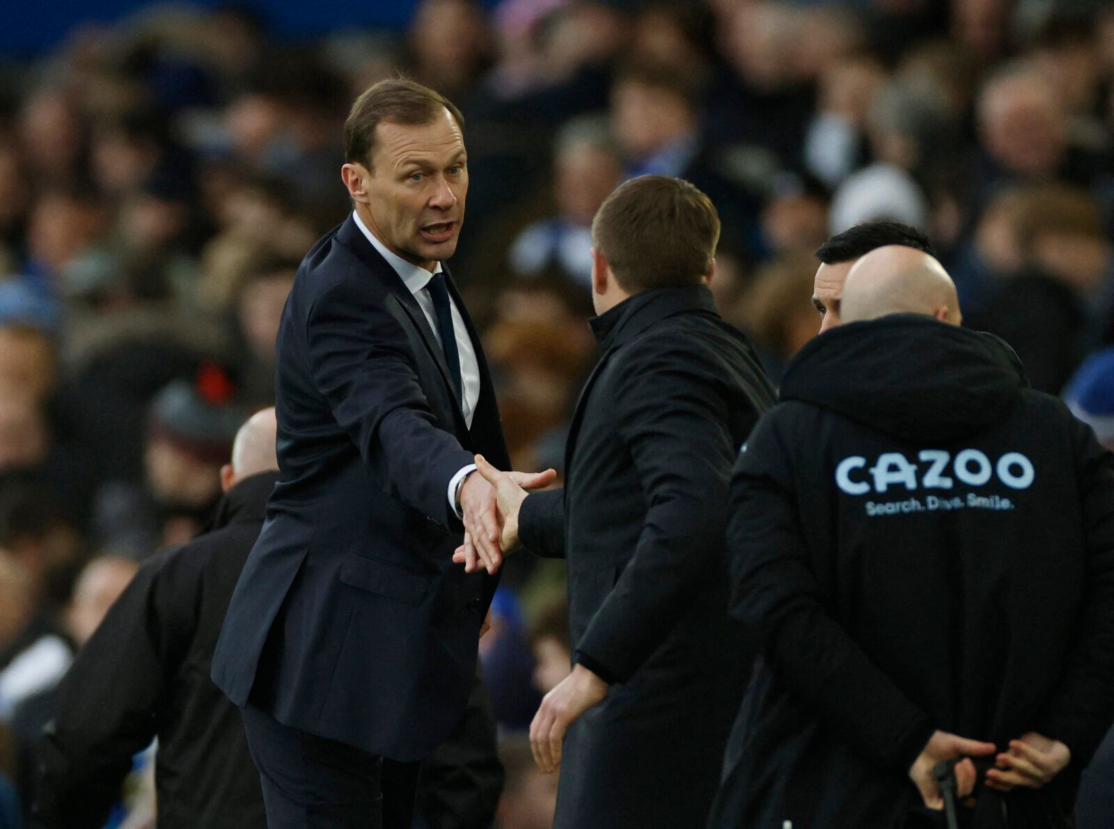 Soccer Football - Premier League - Everton v Aston Villa - Goodison Park, Liverpool, Britain - January 22, 2022 Everton interim manager Duncan Ferguson shakes hands with Aston Villa manager Steven Gerrard after the match Action Images via Reuters/Jason Cairnduff EDITORIAL USE ONLY. No use with unauthorized audio, video, data, fixture lists, club/league logos or 'live' services. Online in-match use limited to 75 images, no video emulation. No use in betting, games or single club /league/player pu