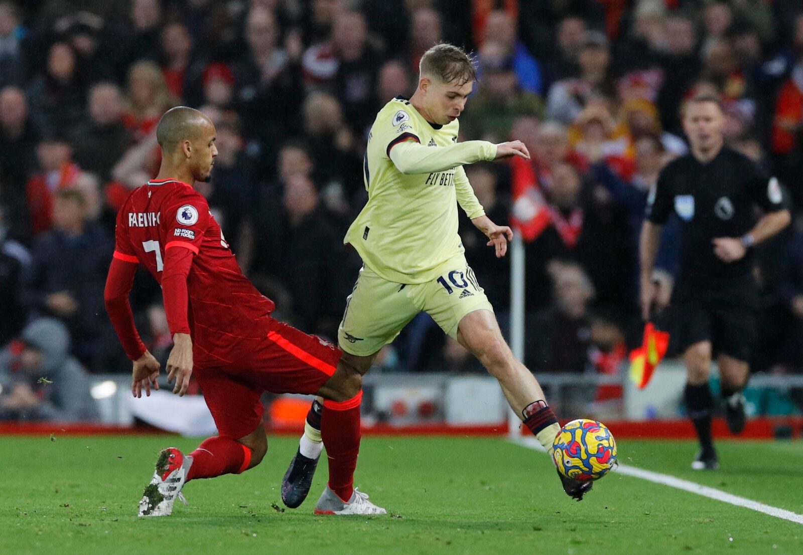 Soccer Football - Premier League - Liverpool v Arsenal - Anfield, Liverpool, Britain - November 20, 2021 Liverpool's Fabinho in action with Arsenal's Emile Smith Rowe Action Images via Reuters/Phil Noble EDITORIAL USE ONLY. No use with unauthorized audio, video, data, fixture lists, club/league logos or 'live' services. Online in-match use limited to 75 images, no video emulation. No use in betting, games or single club /league/player publications.  Please contact your account representative for