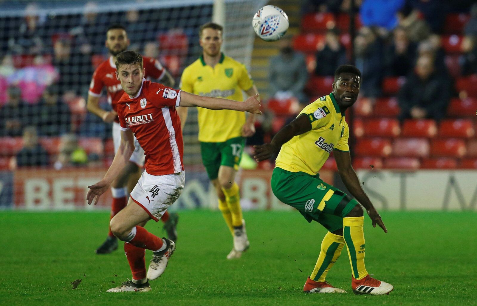 Soccer Football - Championship - Barnsley vs Norwich City - Oakwell, Barnsley, Britain - March 13, 2018   Barnsley's Joe Williams (L) in action with Norwich City's Alexander Tettey   Action Images/Craig Brough    EDITORIAL USE ONLY. No use with unauthorized audio, video, data, fixture lists, club/league logos or 